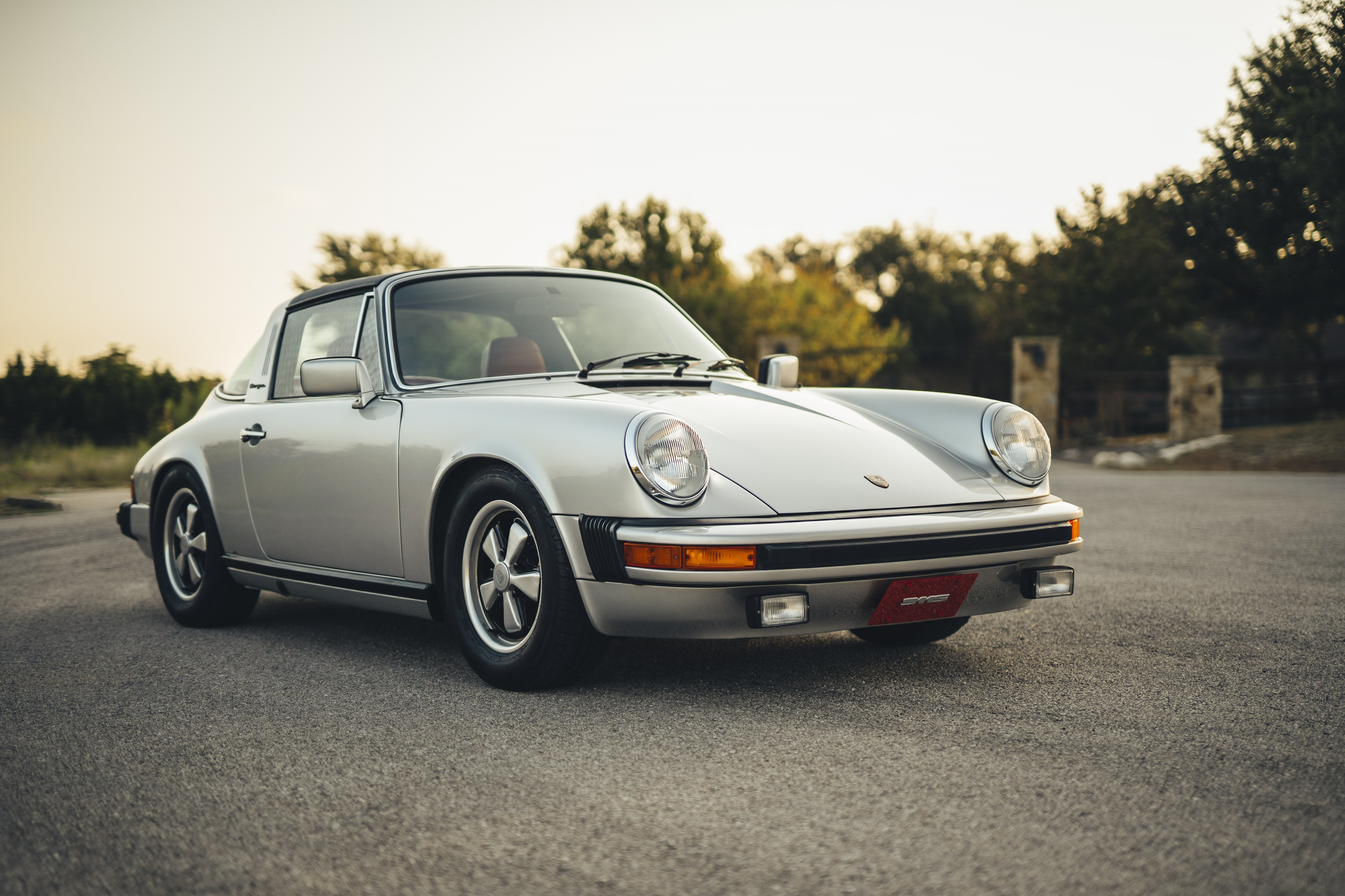 Silver on red Porsche 911S in Dripping Springs, TX.