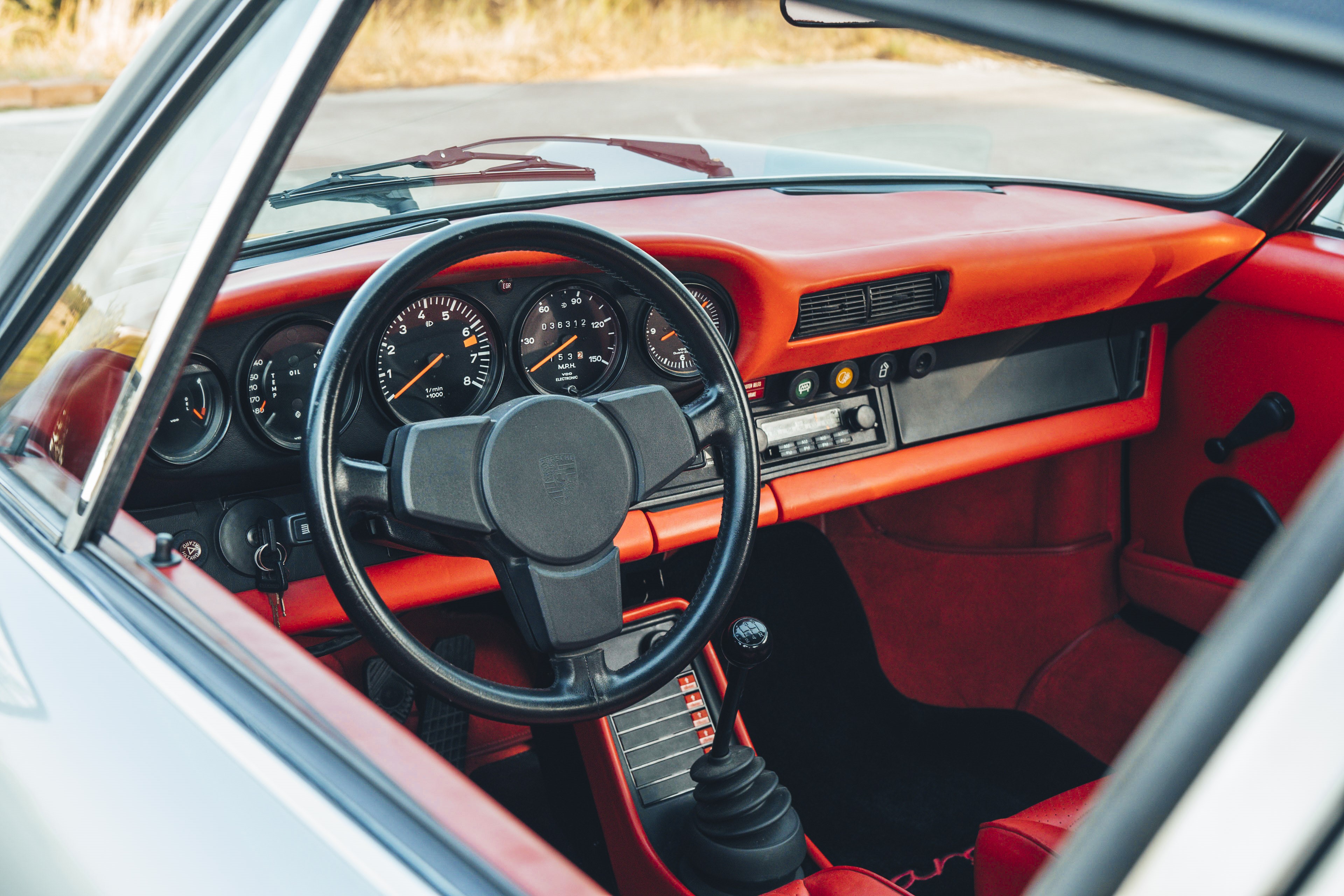 Light red interior on a 1977 Porsche 911S.