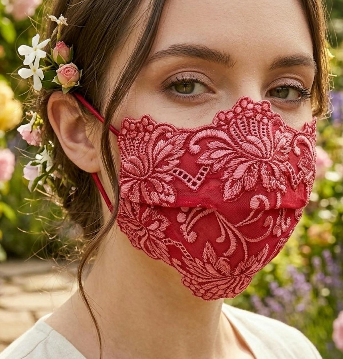 red lace floral face mask with scalloped edge and beautiful embroidered flower design.