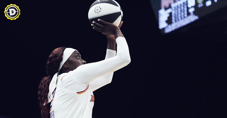Kahleah Copper taking a jumpshot.