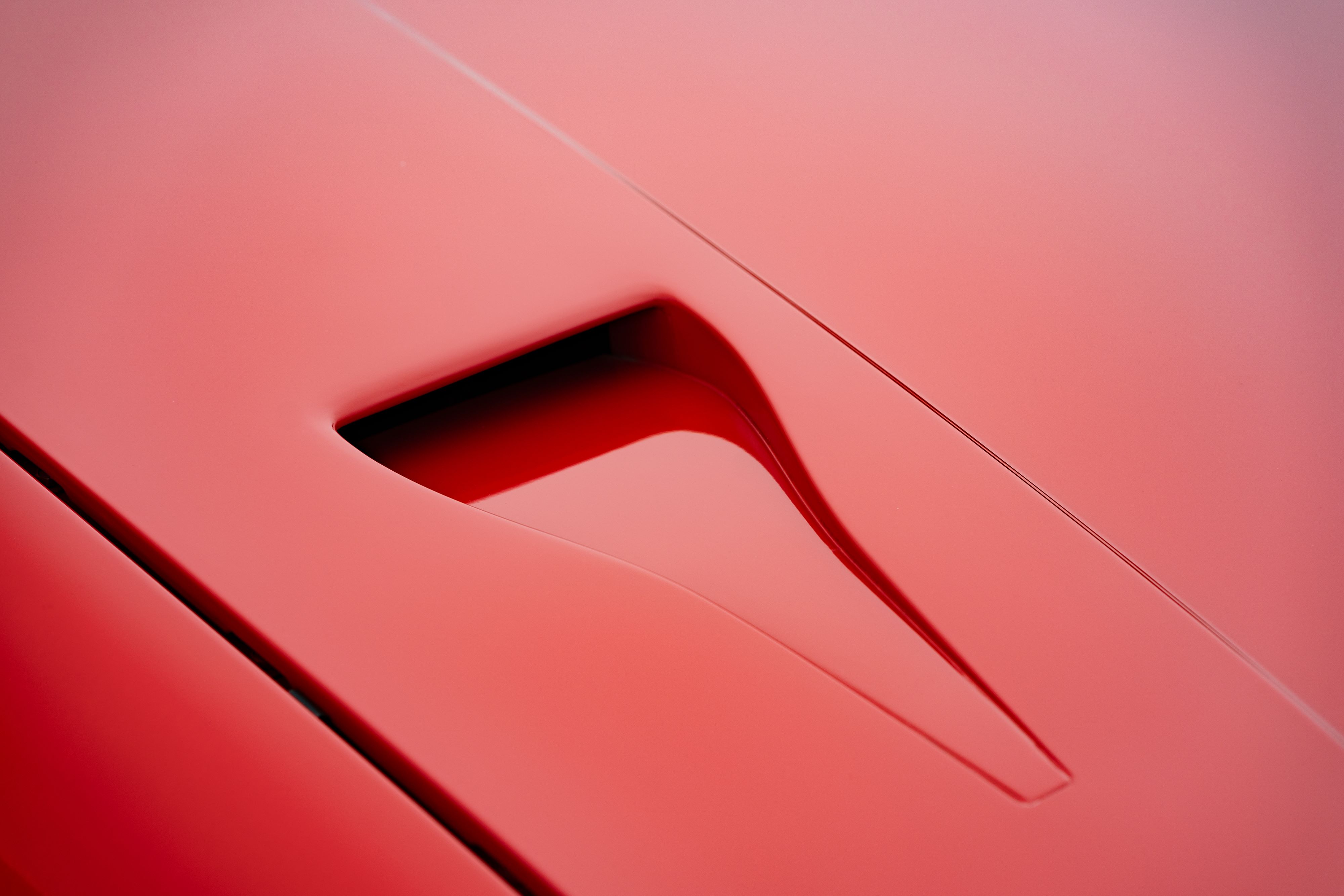 Intake scoop on a Guards Red Porsche 924 Turbo in Dripping Springs, TX.