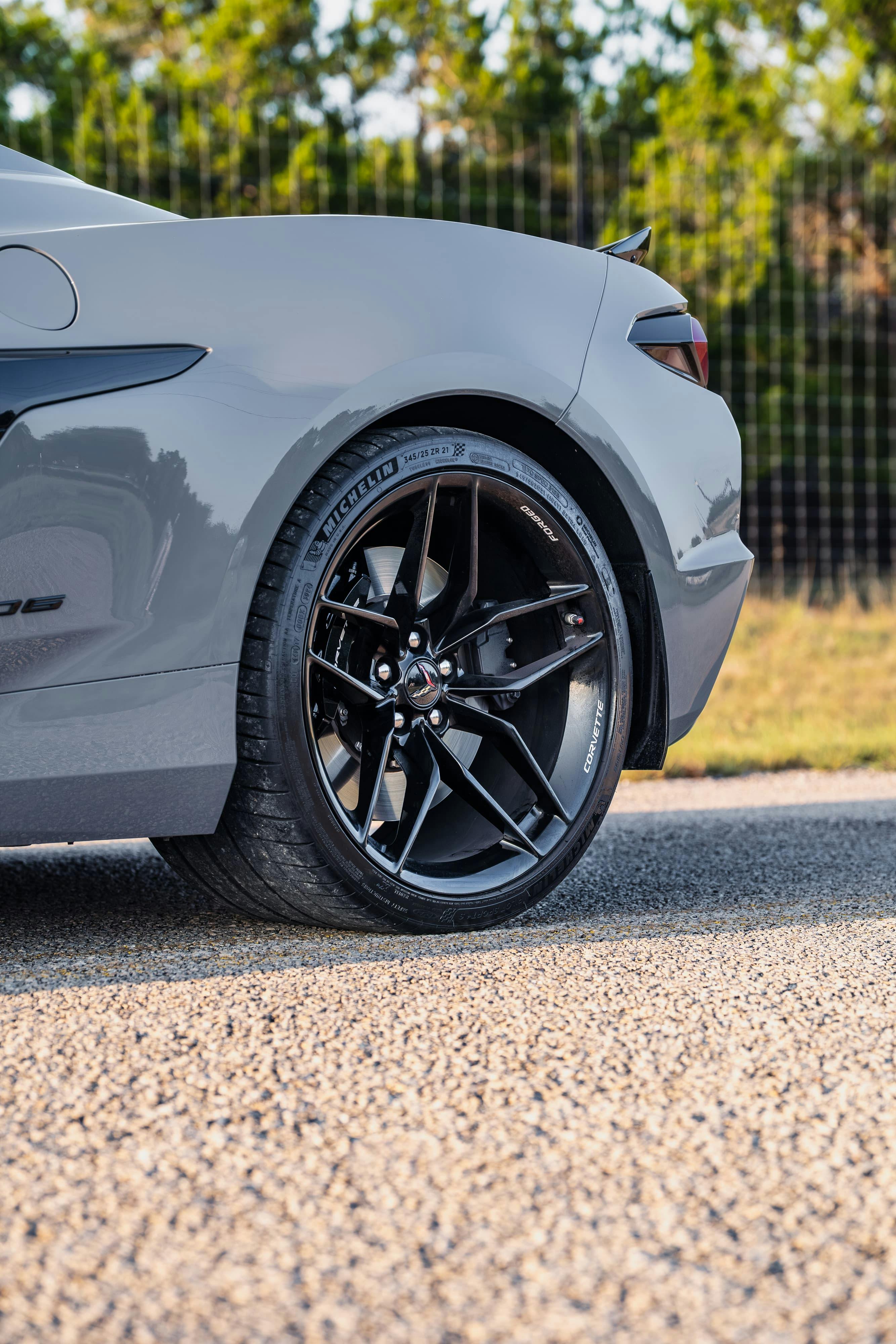 Rear wheel on a 2025 Chevrolet Corvette Z06 in Sea Wolf Gray Tricoat in Dripping Springs, TX.