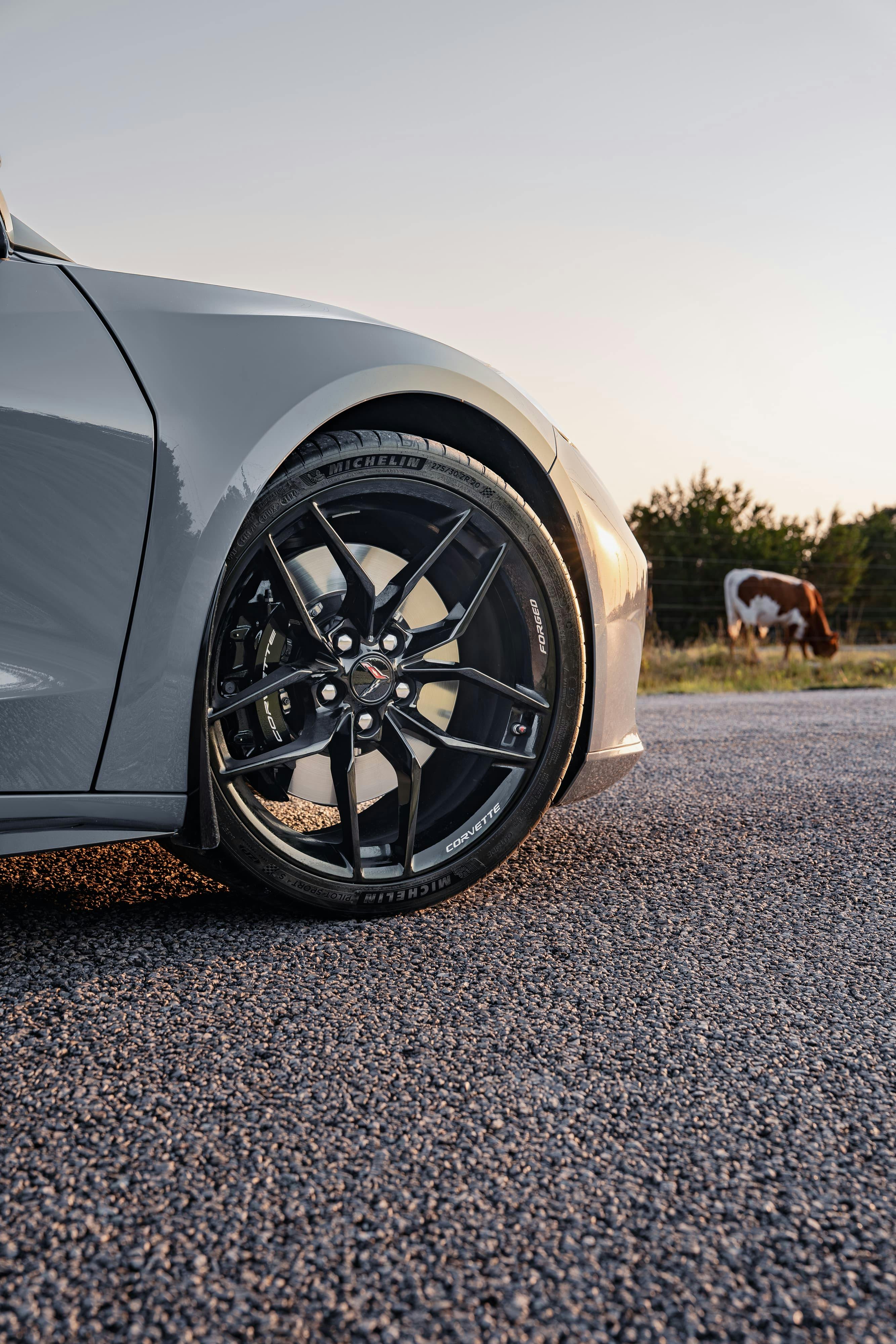 Front wheel of a 2025 Chevrolet Corvette Z06 in Sea Wolf Gray Tricoat in Dripping Springs, TX.