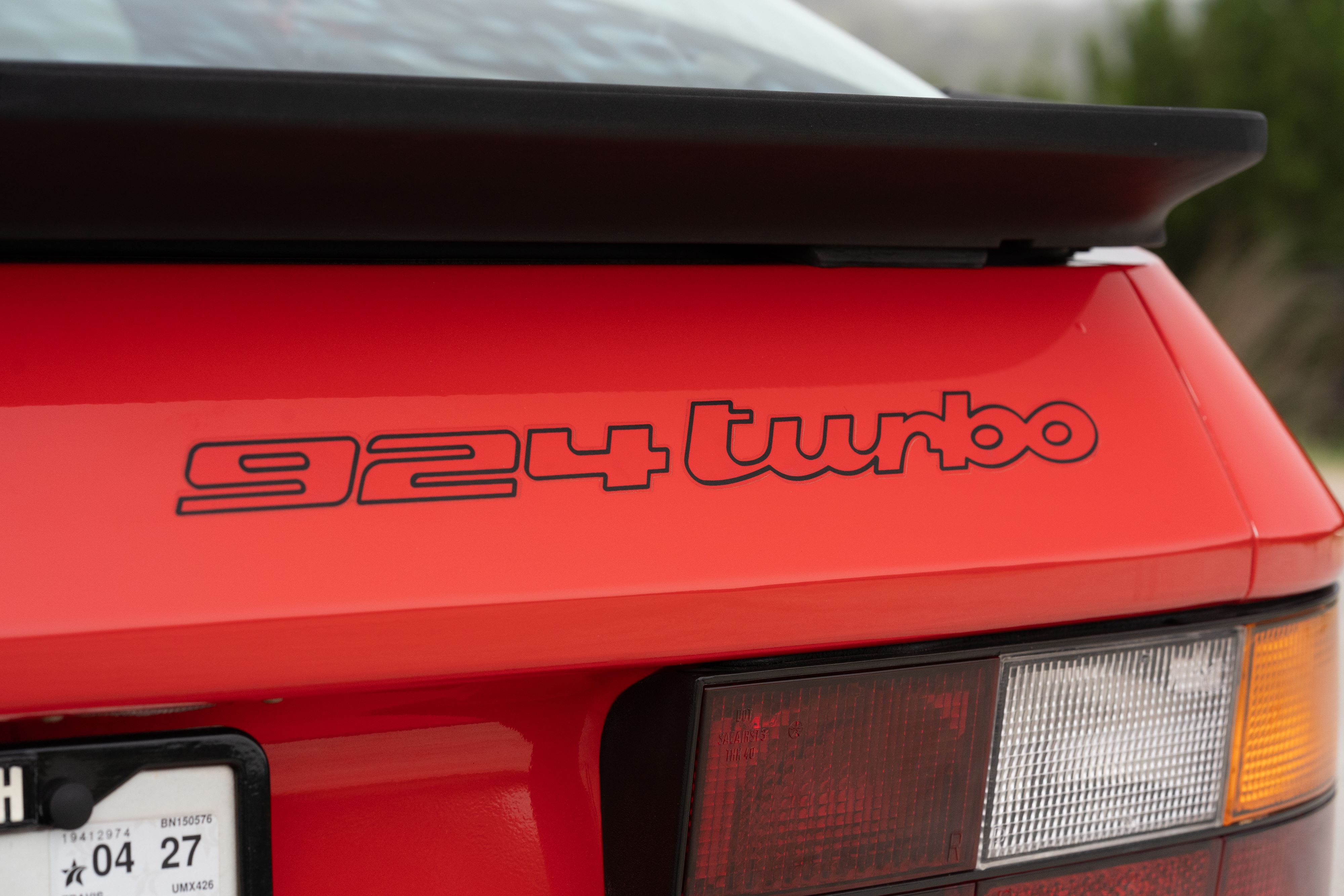 Guards Red Porsche 924 Turbo badging in Dripping Springs, TX.