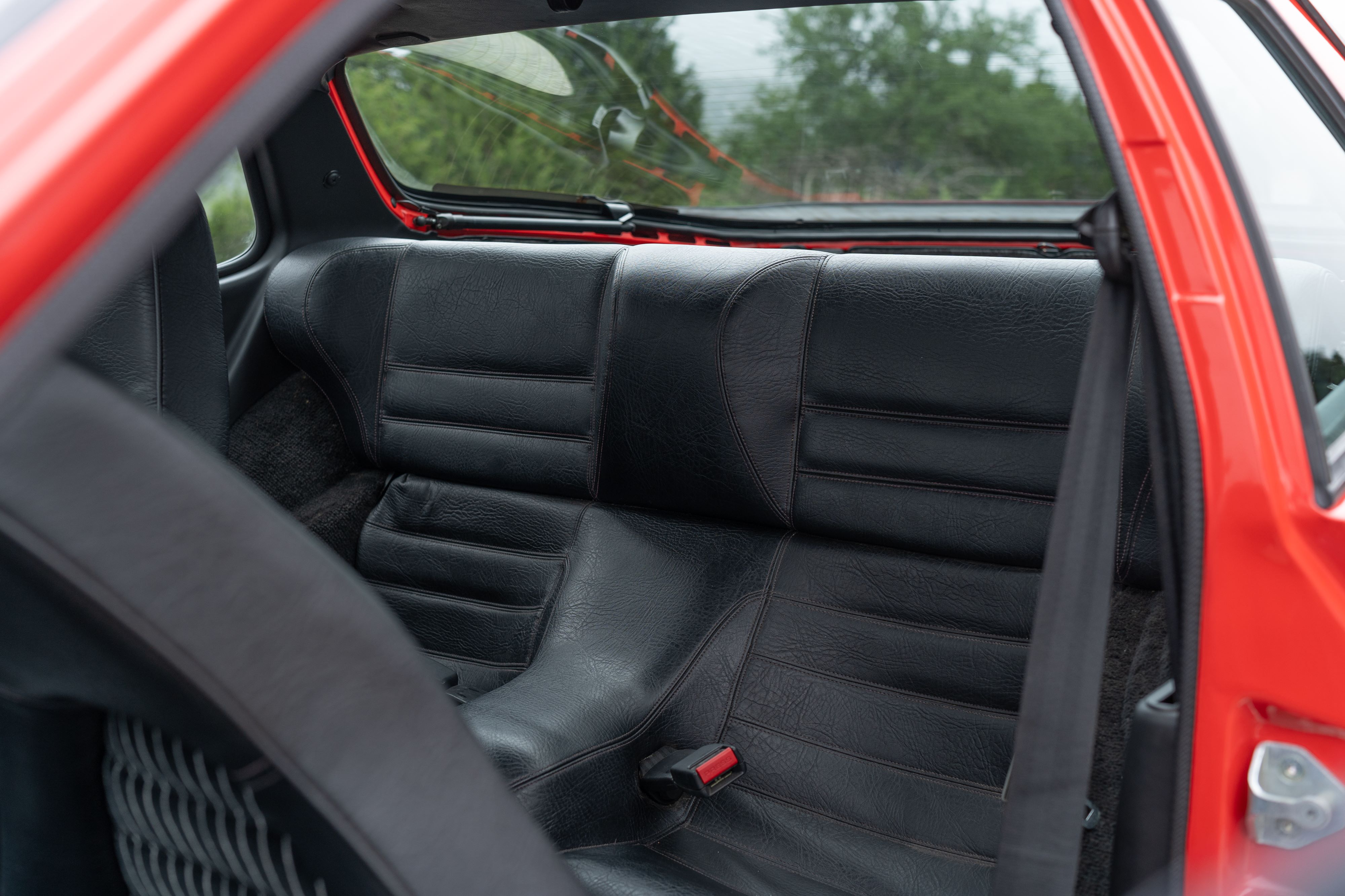 Guards Red Porsche 924 Turbo rear seats in Dripping Springs, TX.