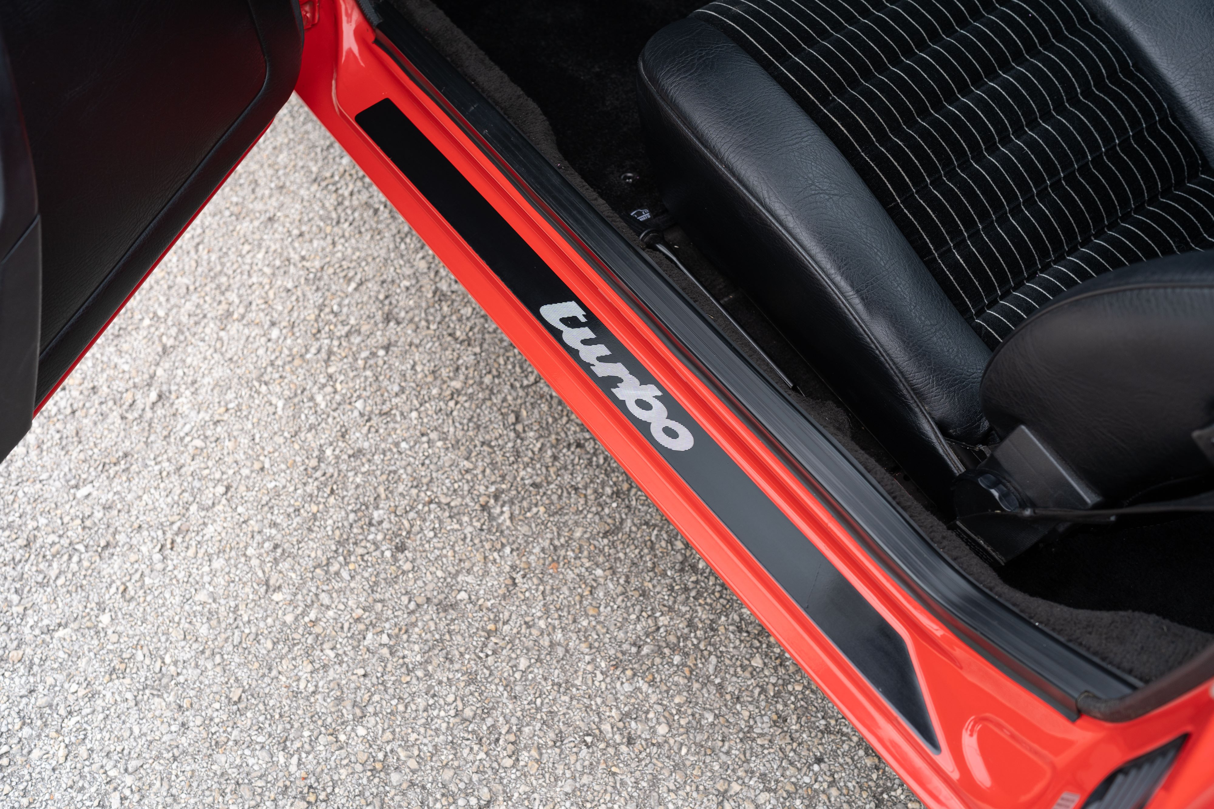 Guards Red Porsche 924 Turbo door sill in Dripping Springs, TX.