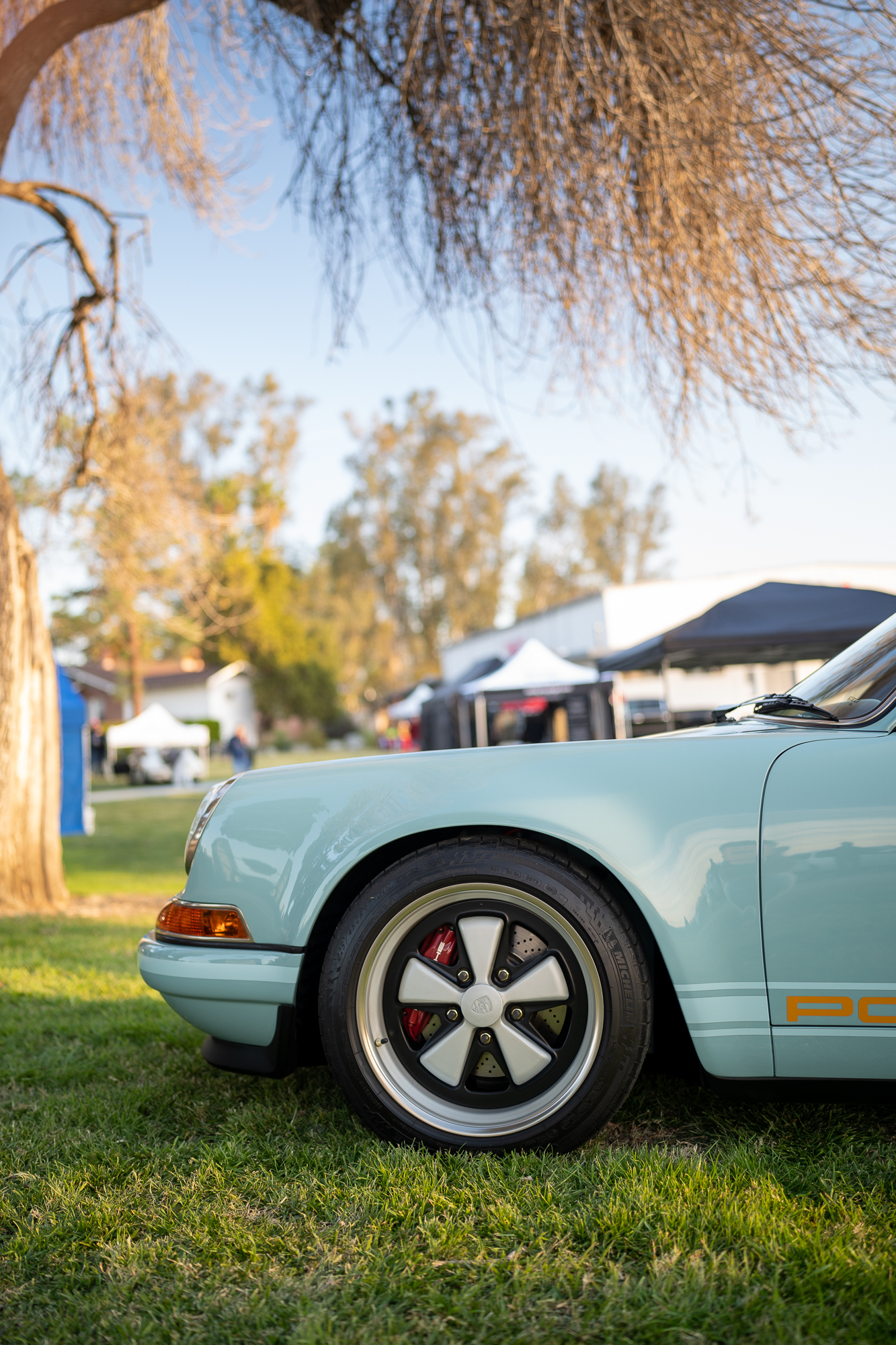 Light blue Singer 911 with a dark brown interior