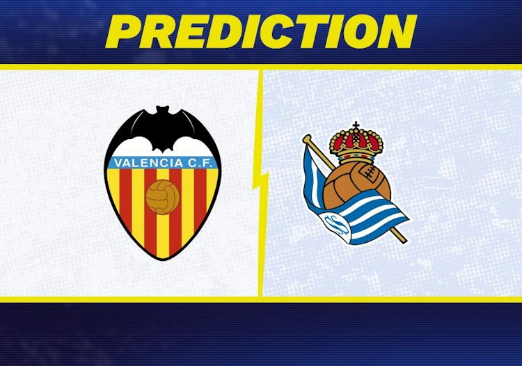 Valencia takes on Real Sociedad in La Liga action.