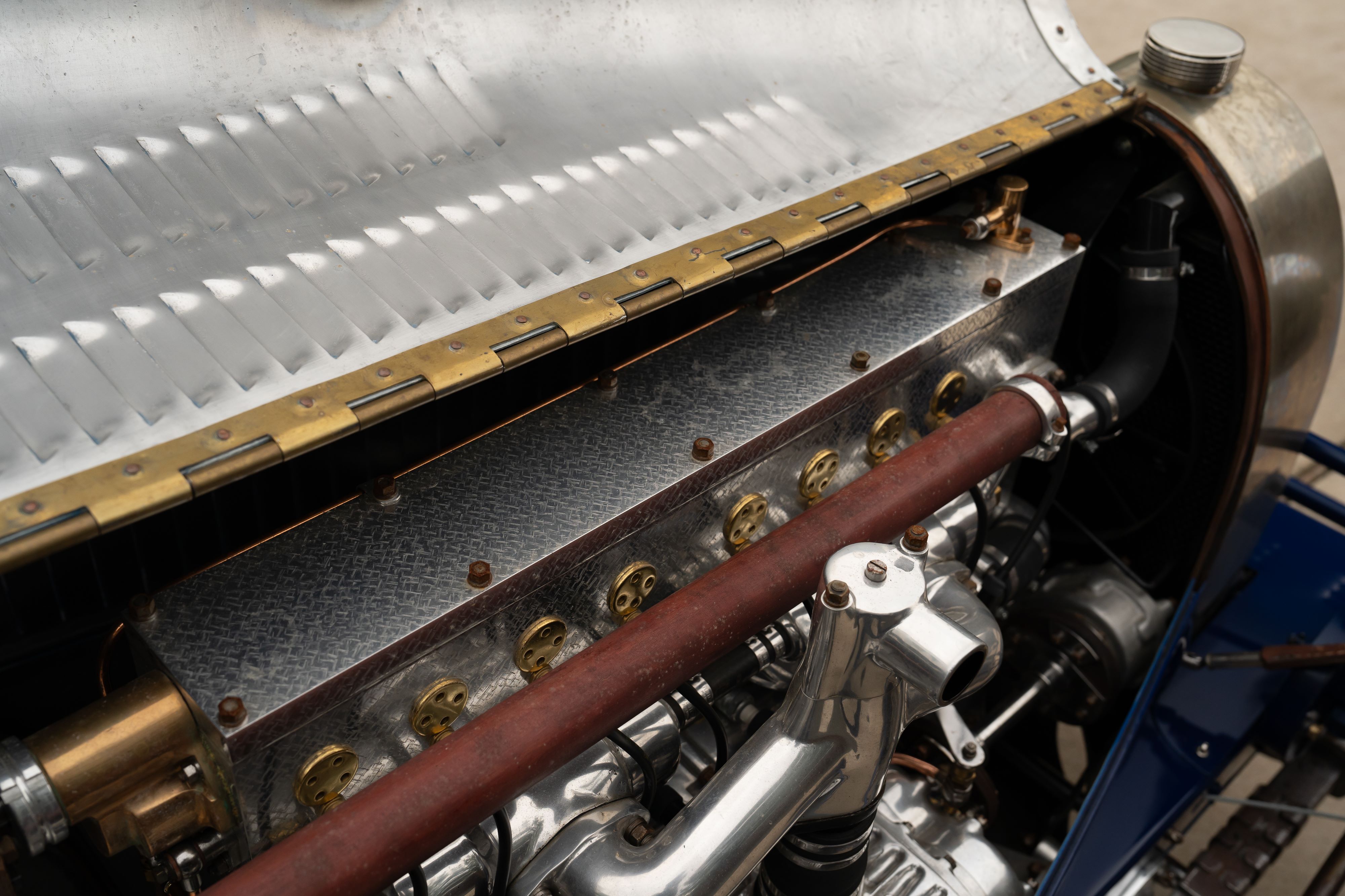 Engine bay of a Pur Sang Bugatti Type 35 in Blue over Brown shot in Austin, TX.