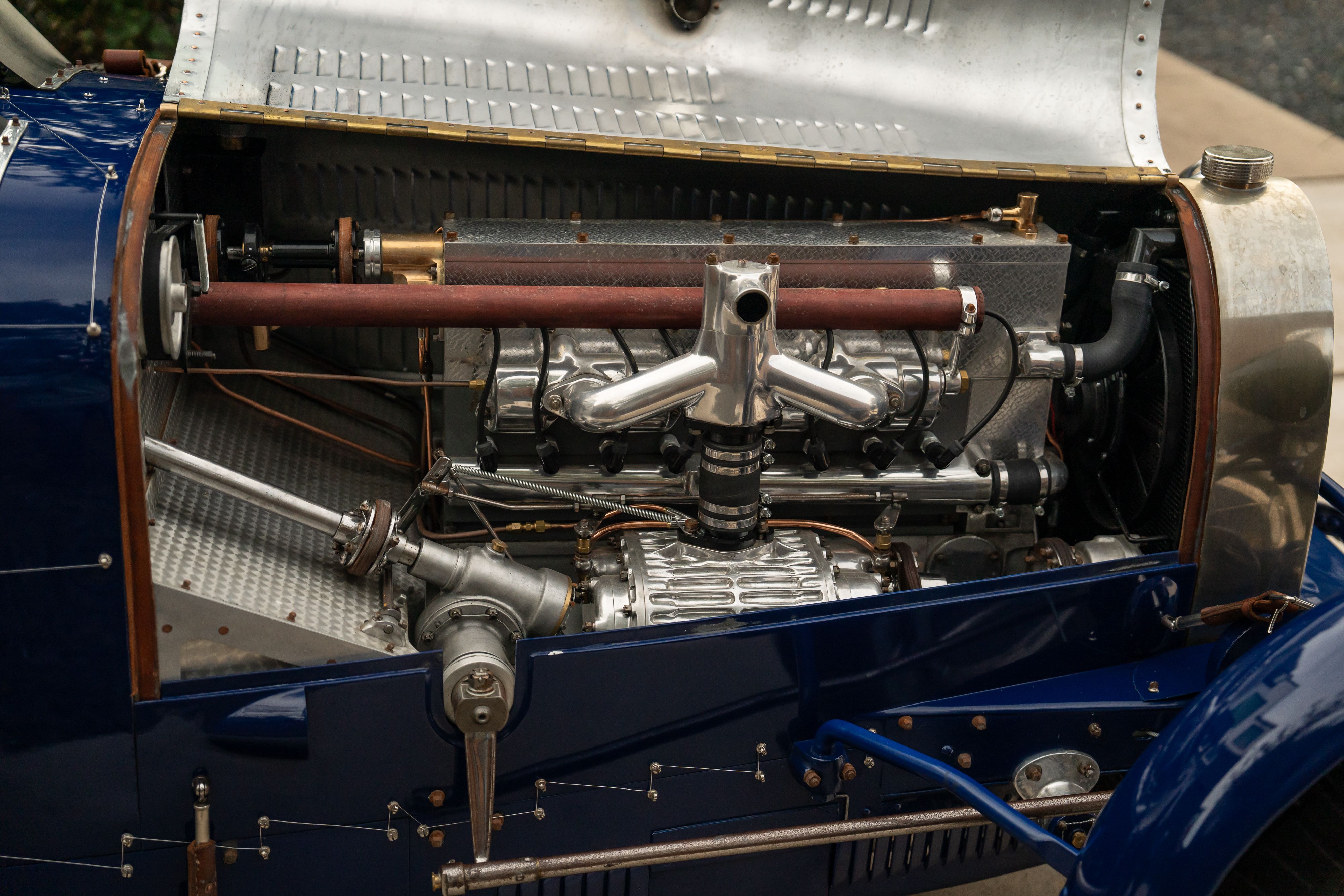 Engine bay of a Pur Sang Bugatti Type 35 in Blue over Brown shot in Austin, TX.