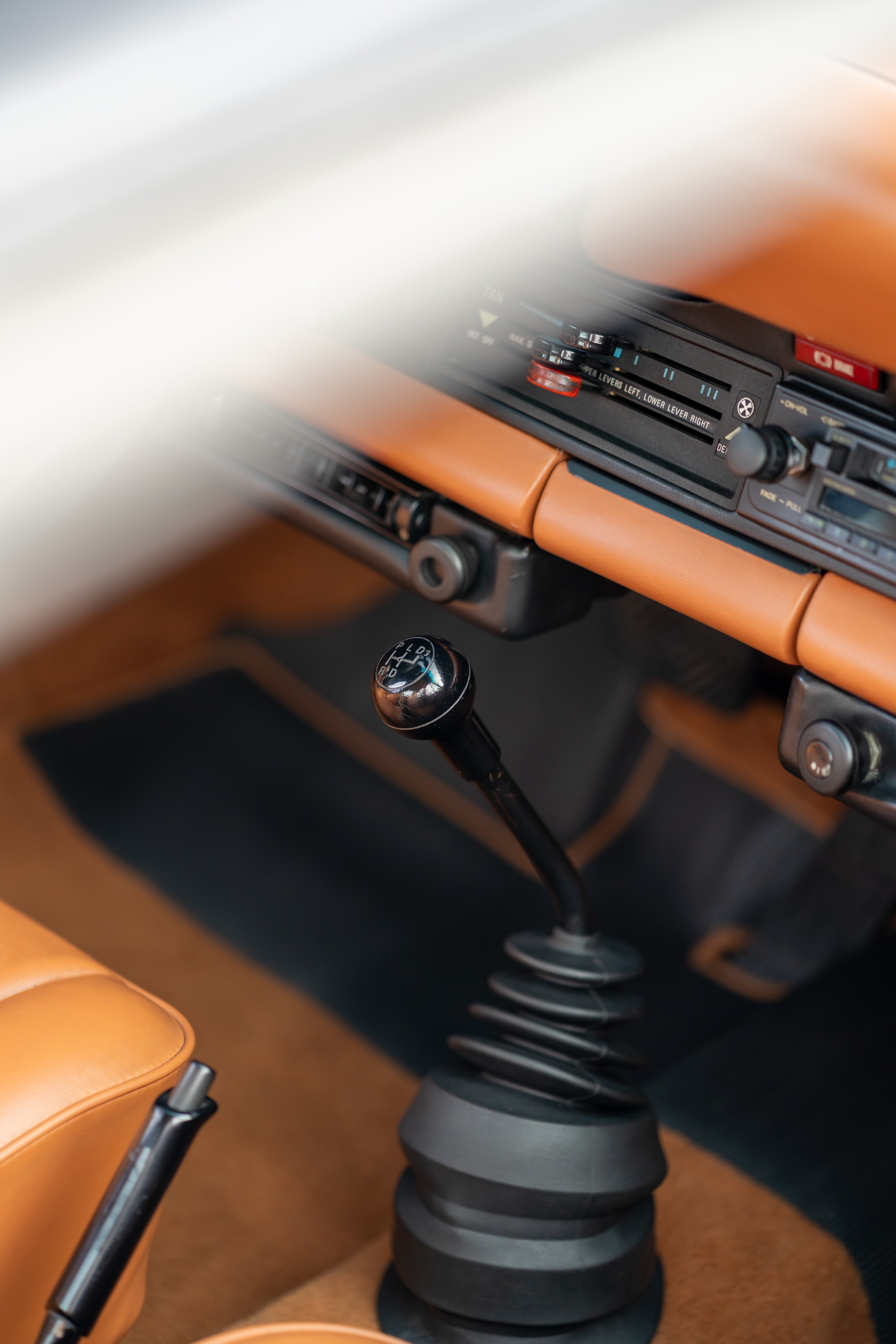 Interior of a 1976 Porsche 911S Sportomatic in Black on Cinnamon.