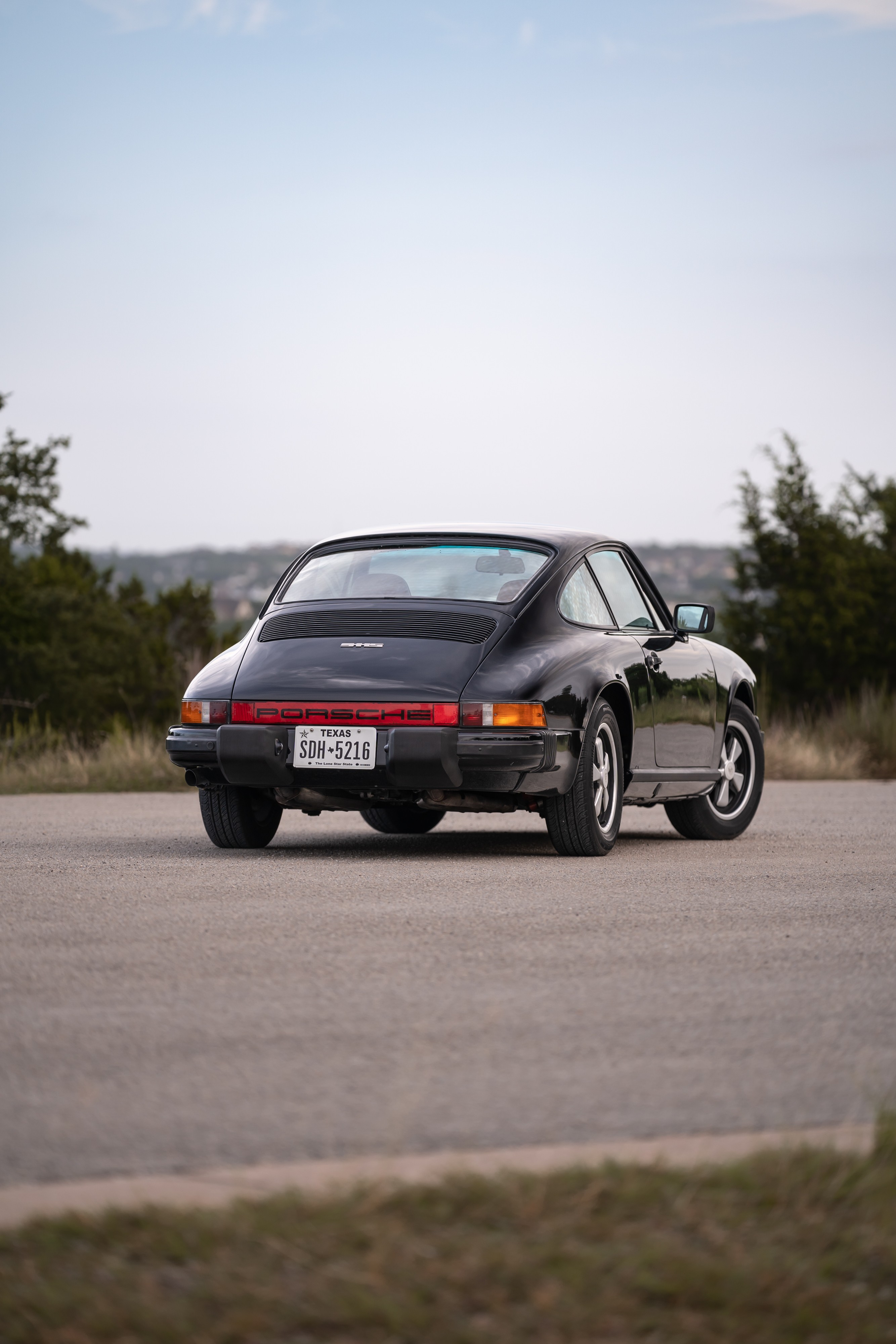 1976 Porsche 911S Sportomatic in Black on Cinnamon.