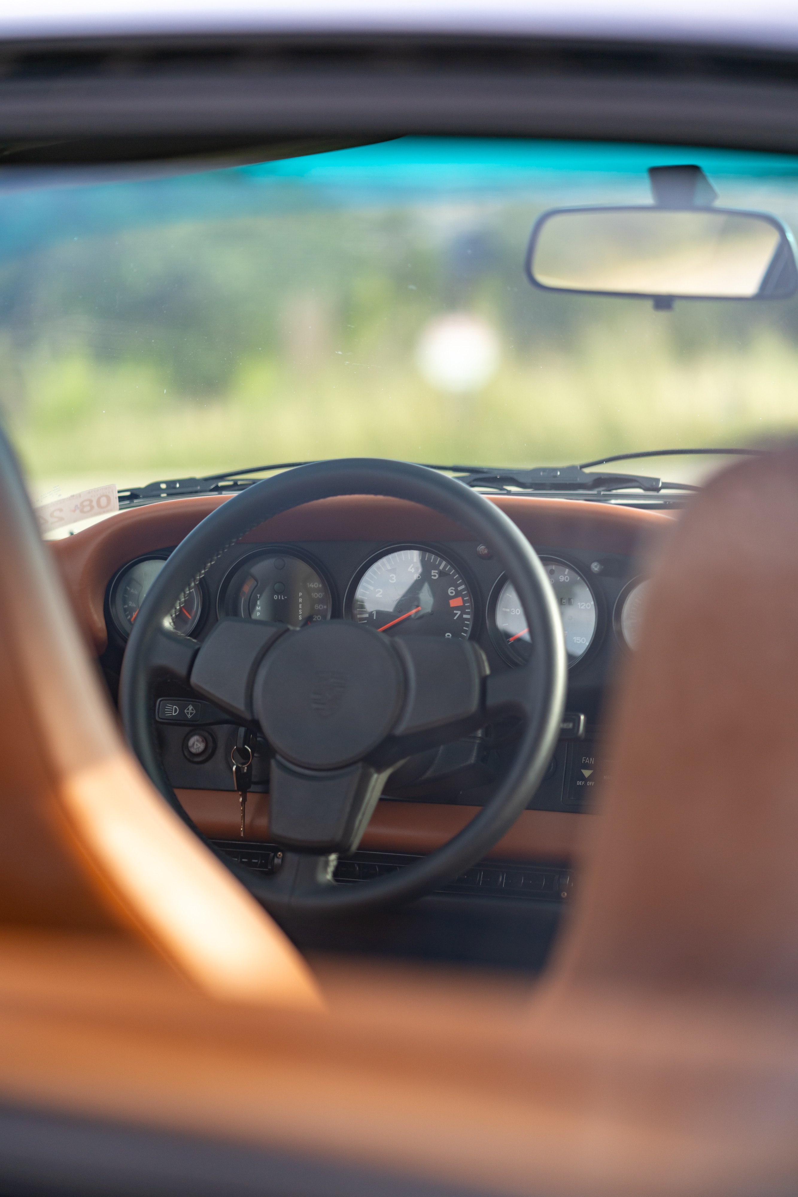 Interior of a 1976 Porsche 911S Sportomatic in Black on Cinnamon.