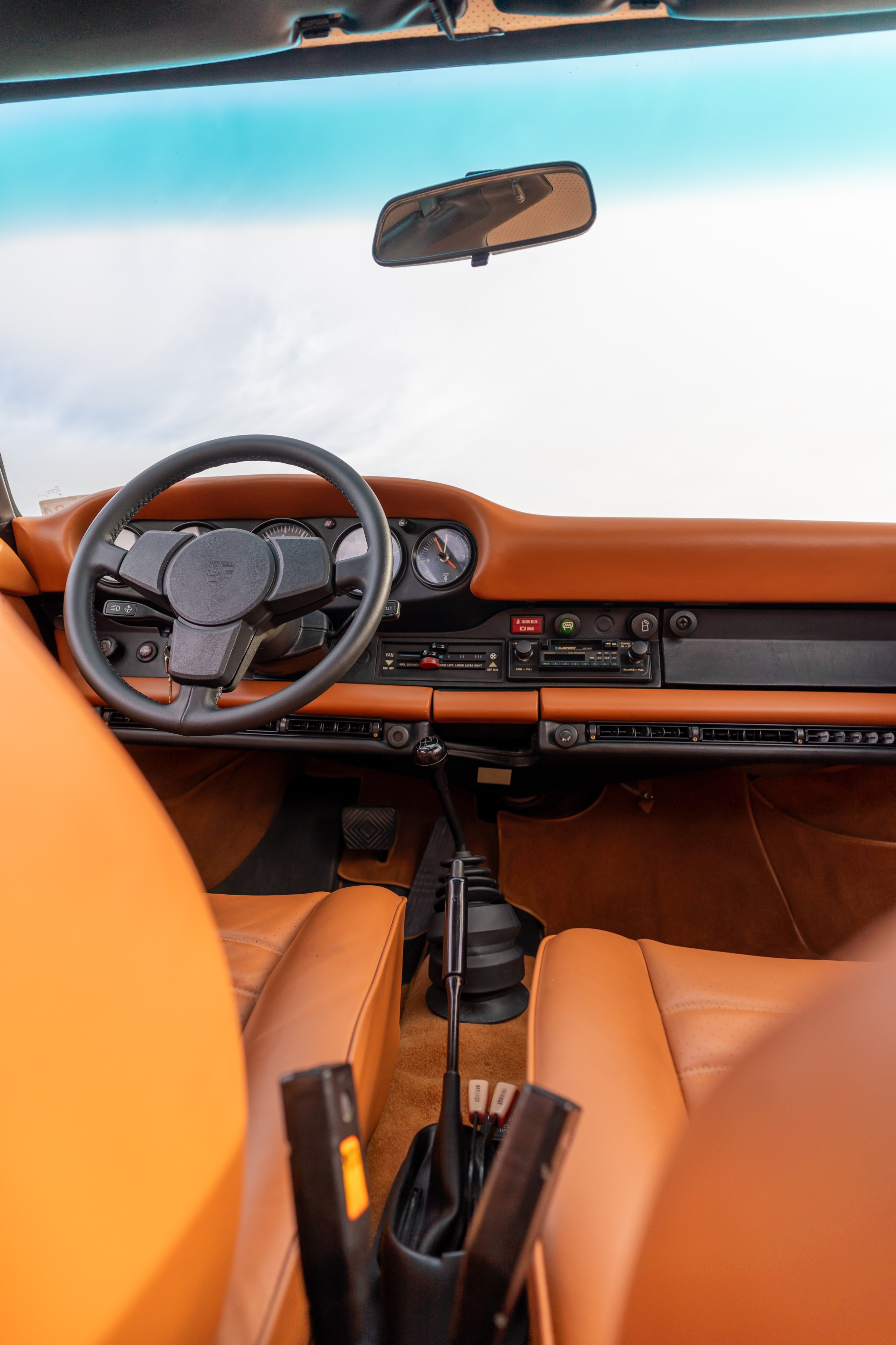 Interior of a 1976 Porsche 911S Sportomatic in Black on Cinnamon.