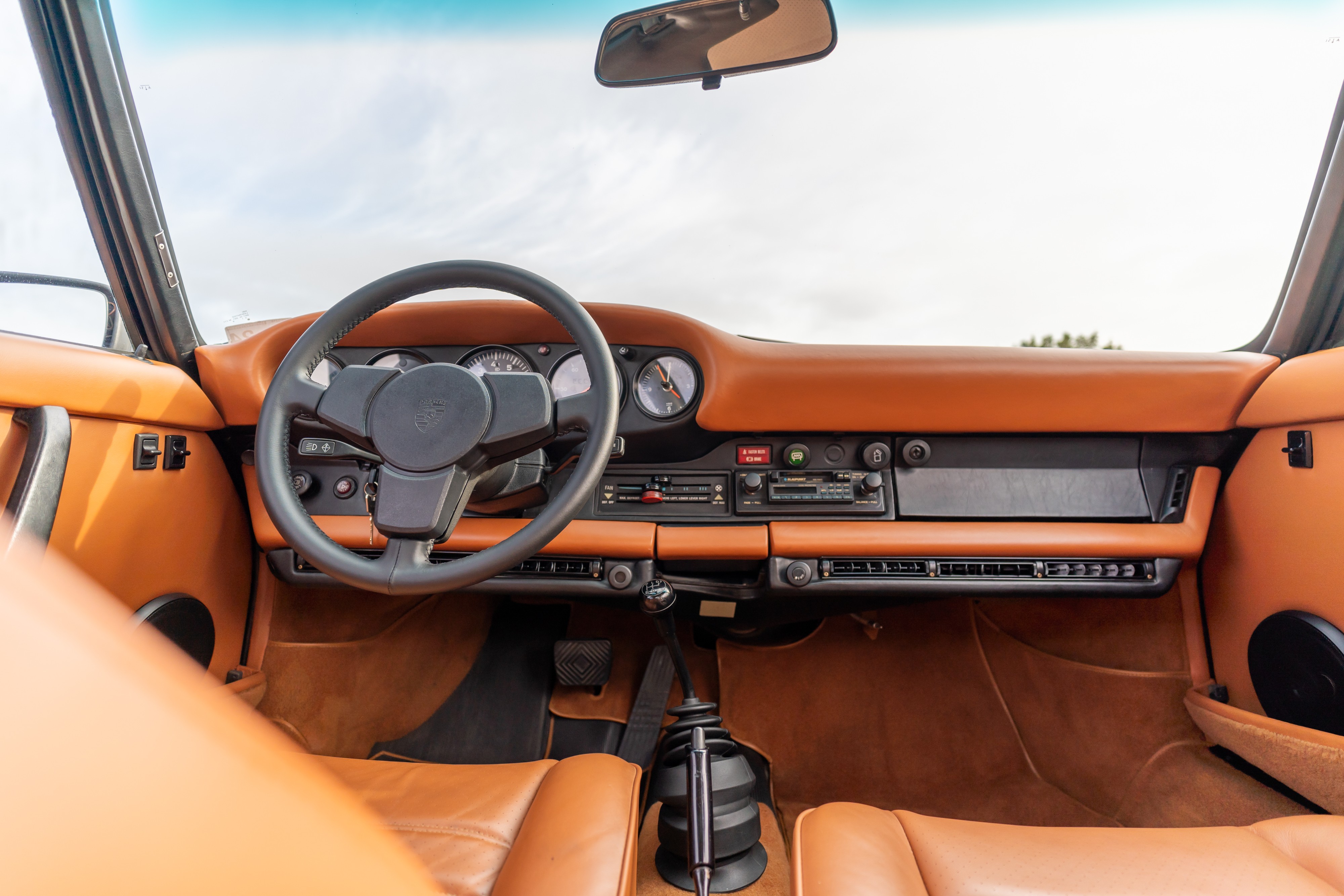 Interior of a 1976 Porsche 911S Sportomatic in Black on Cinnamon.