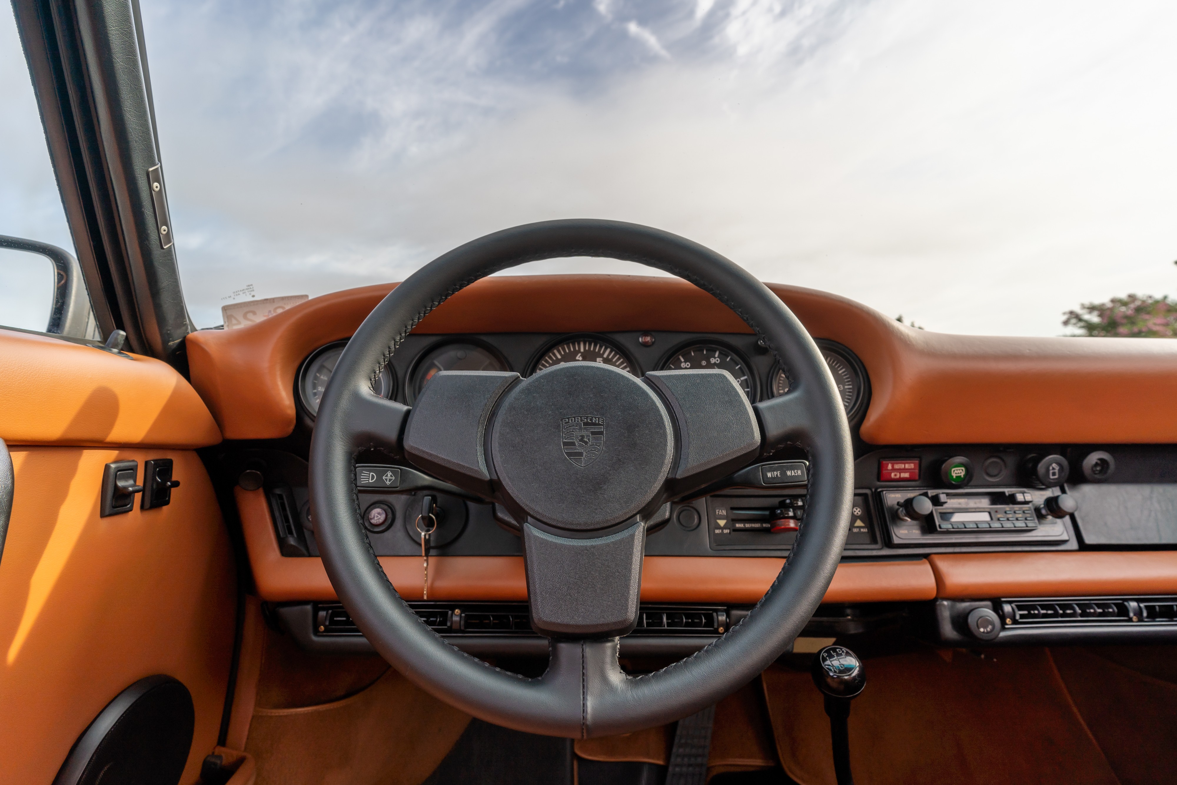 Interior of a 1976 Porsche 911S Sportomatic in Black on Cinnamon.