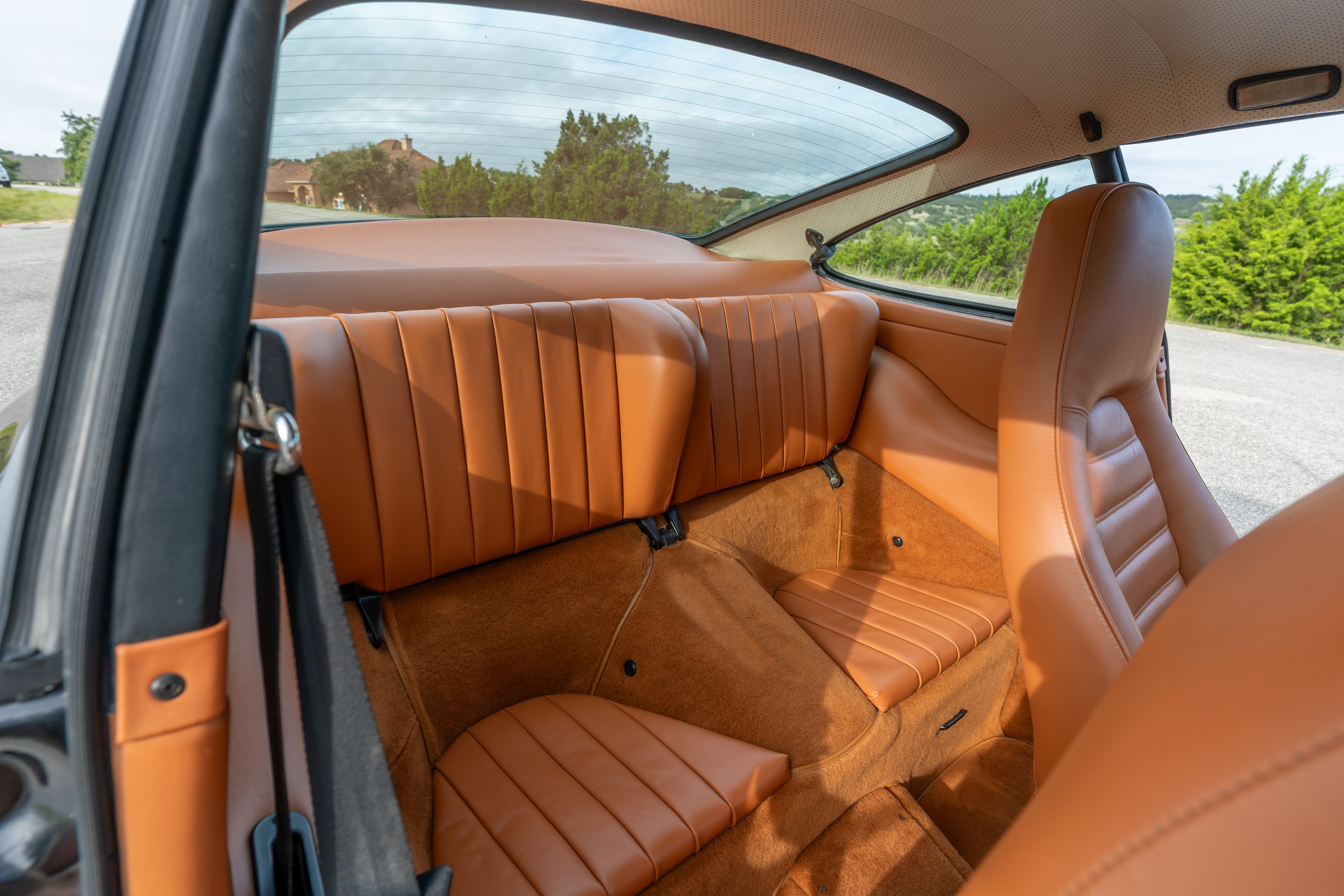 Interior of a 1976 Porsche 911S Sportomatic in Black on Cinnamon.