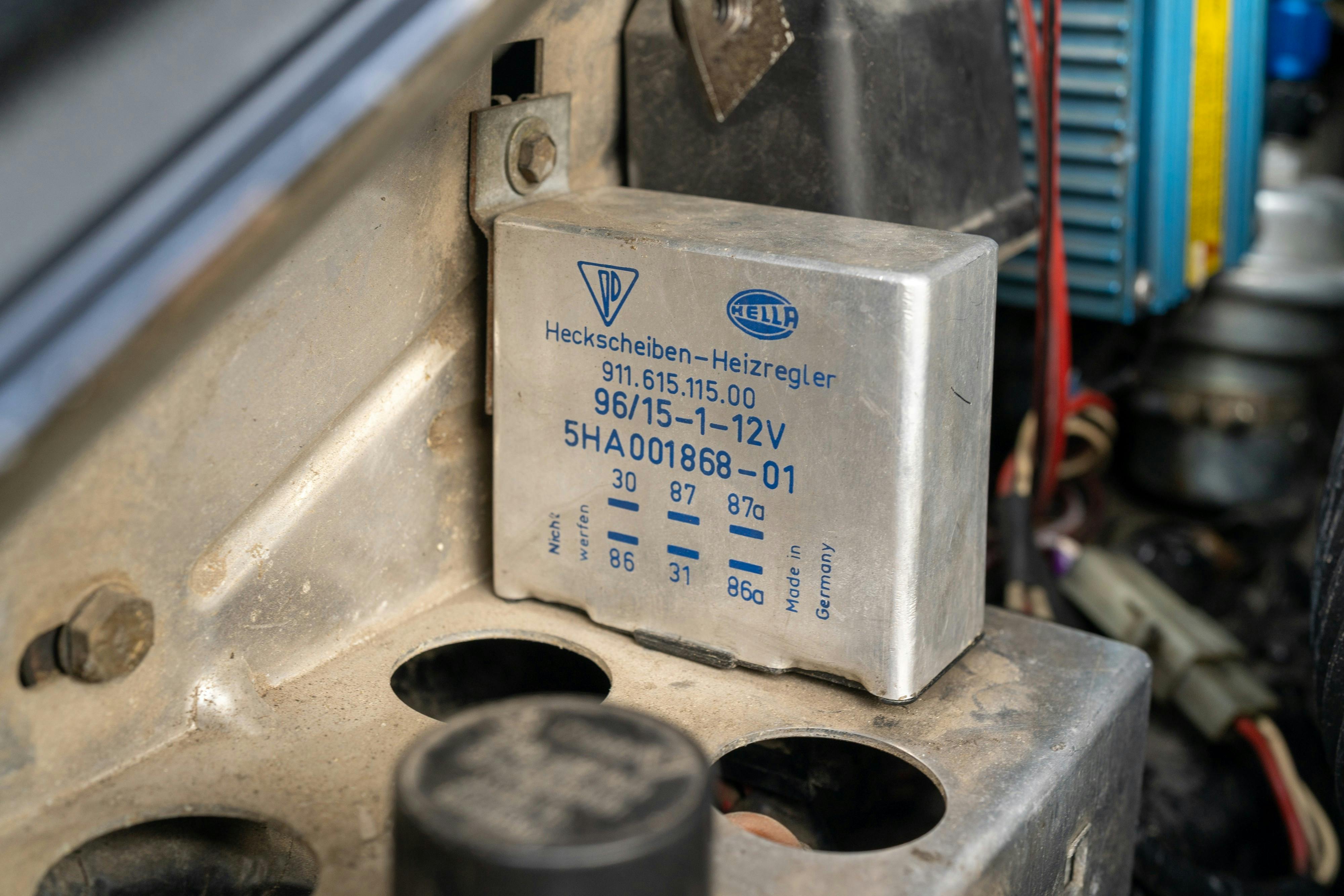 Engine bay of a 1976 Porsche 911S Sportomatic in Black on Cinnamon.
