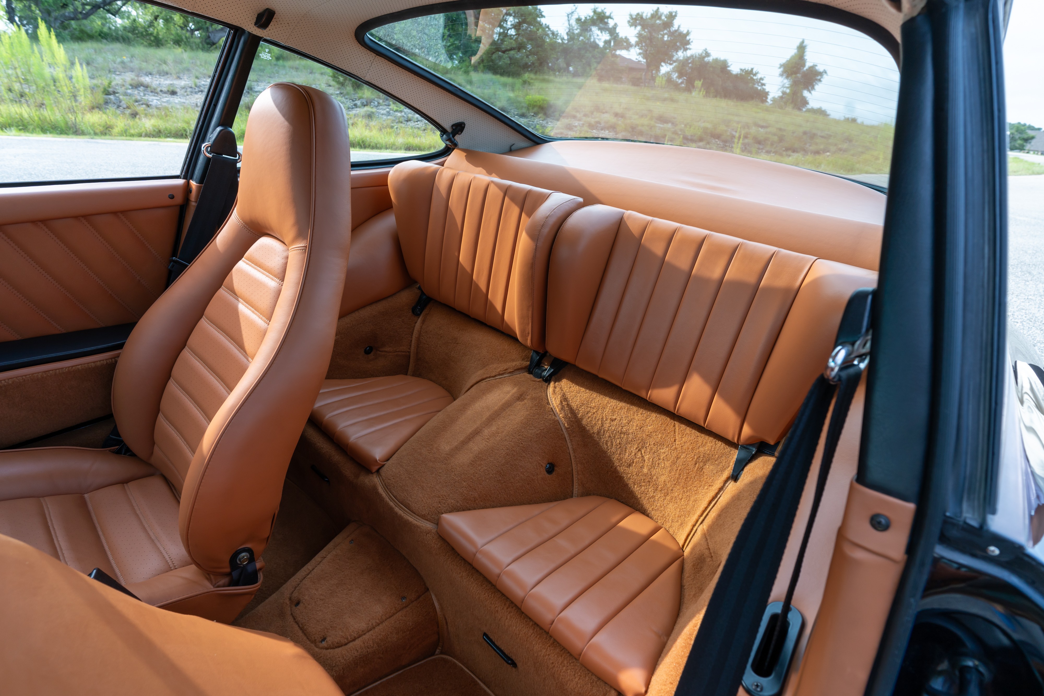 Interior of a 1976 Porsche 911S Sportomatic in Black on Cinnamon.