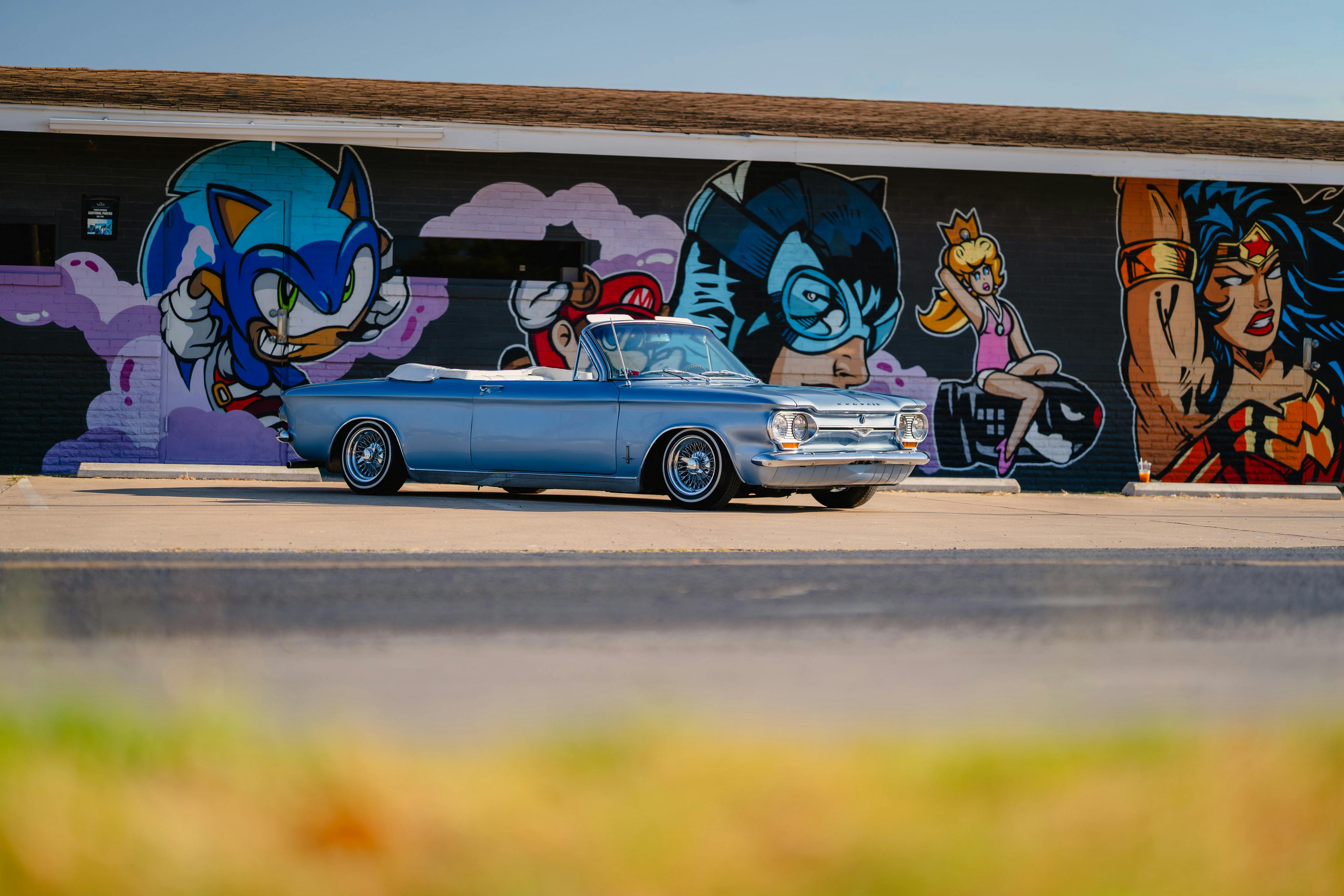 1966 Chevrolet Corvair Convertible in Blue with white interior shot in Austin, TX near St. Elmo.