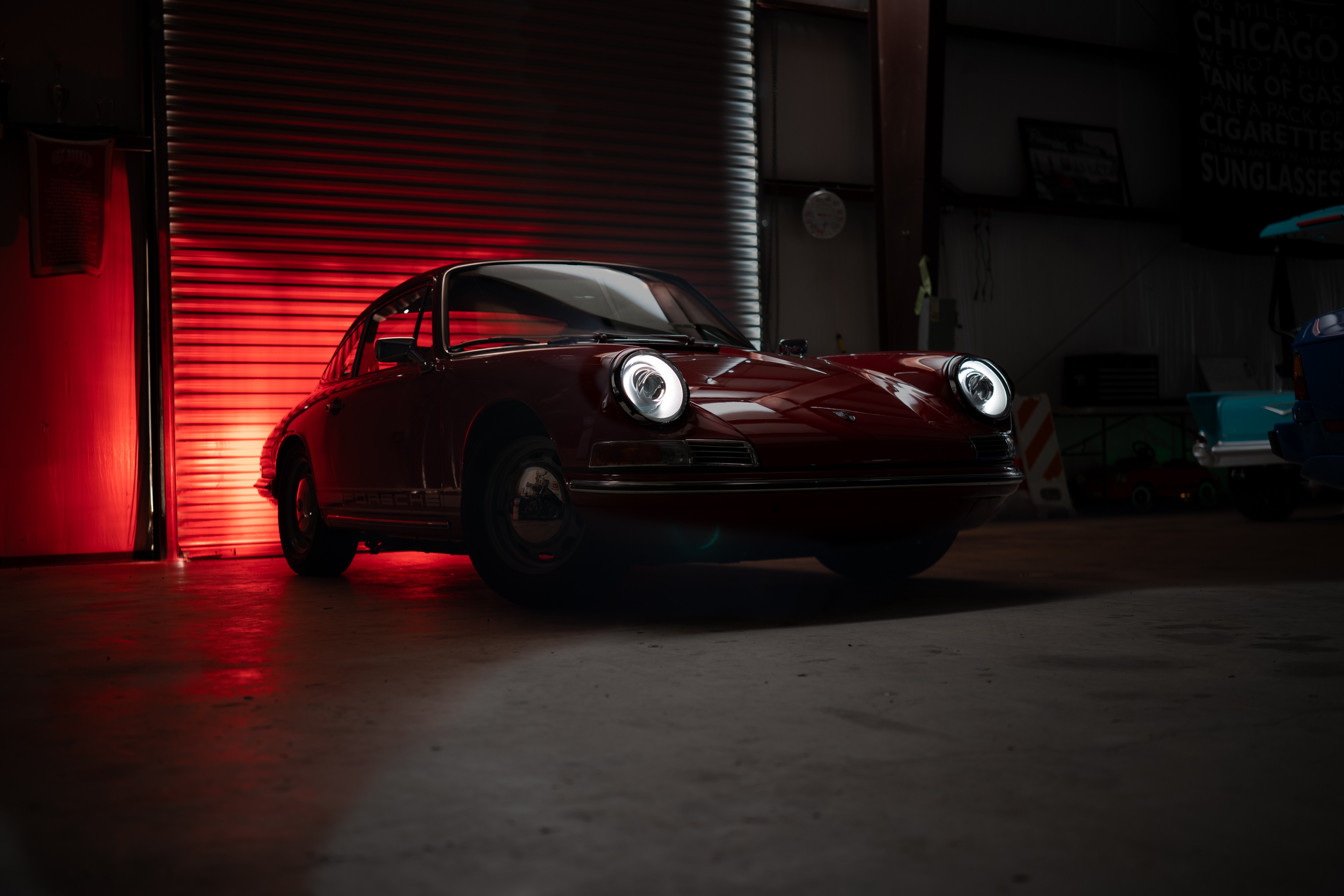 3.0L swapped 1967 Porsche 912 Coupe in a dark garage.