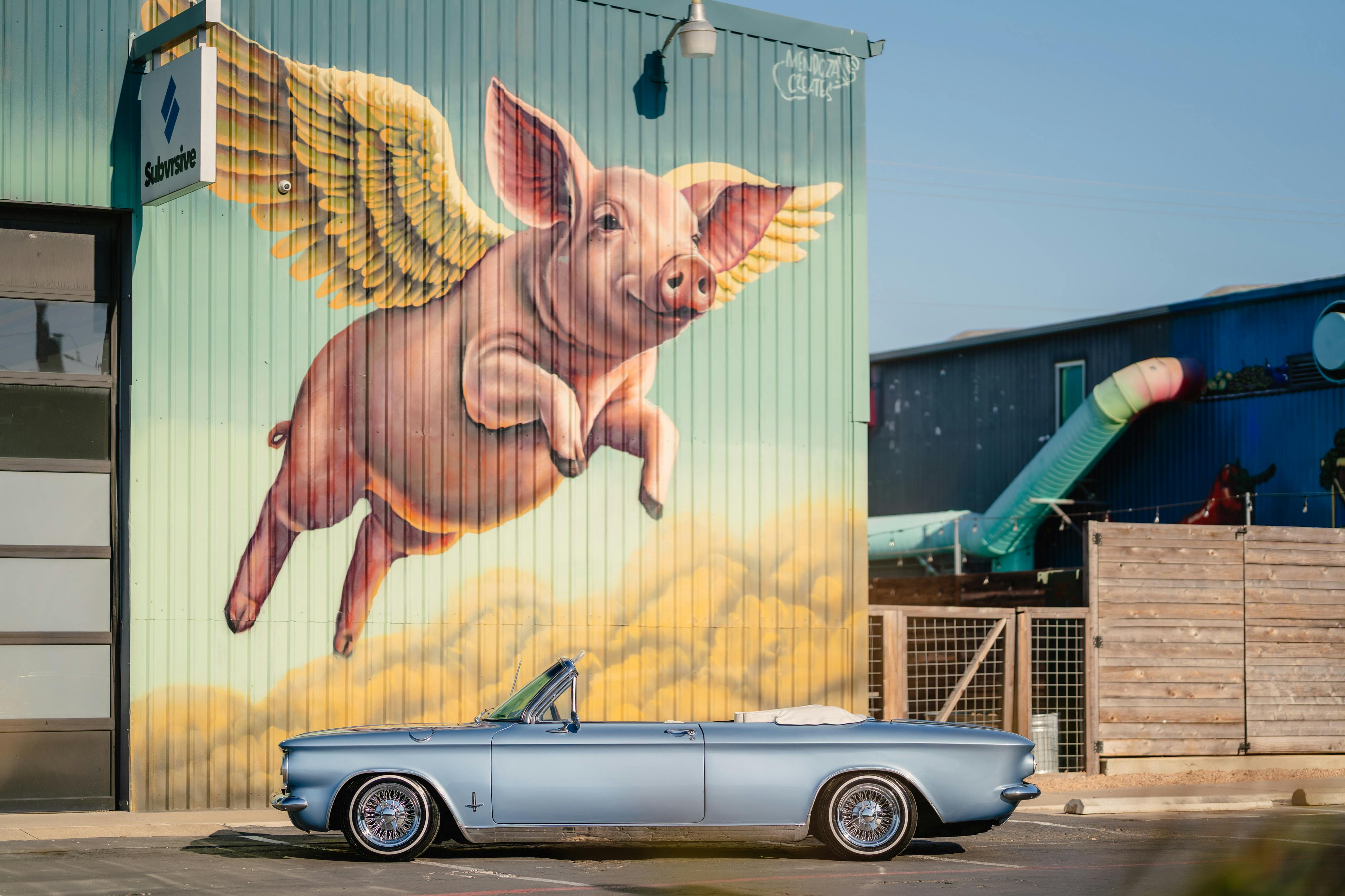 1966 Chevrolet Corvair Convertible in Blue with white interior shot in Austin, TX near St. Elmo.