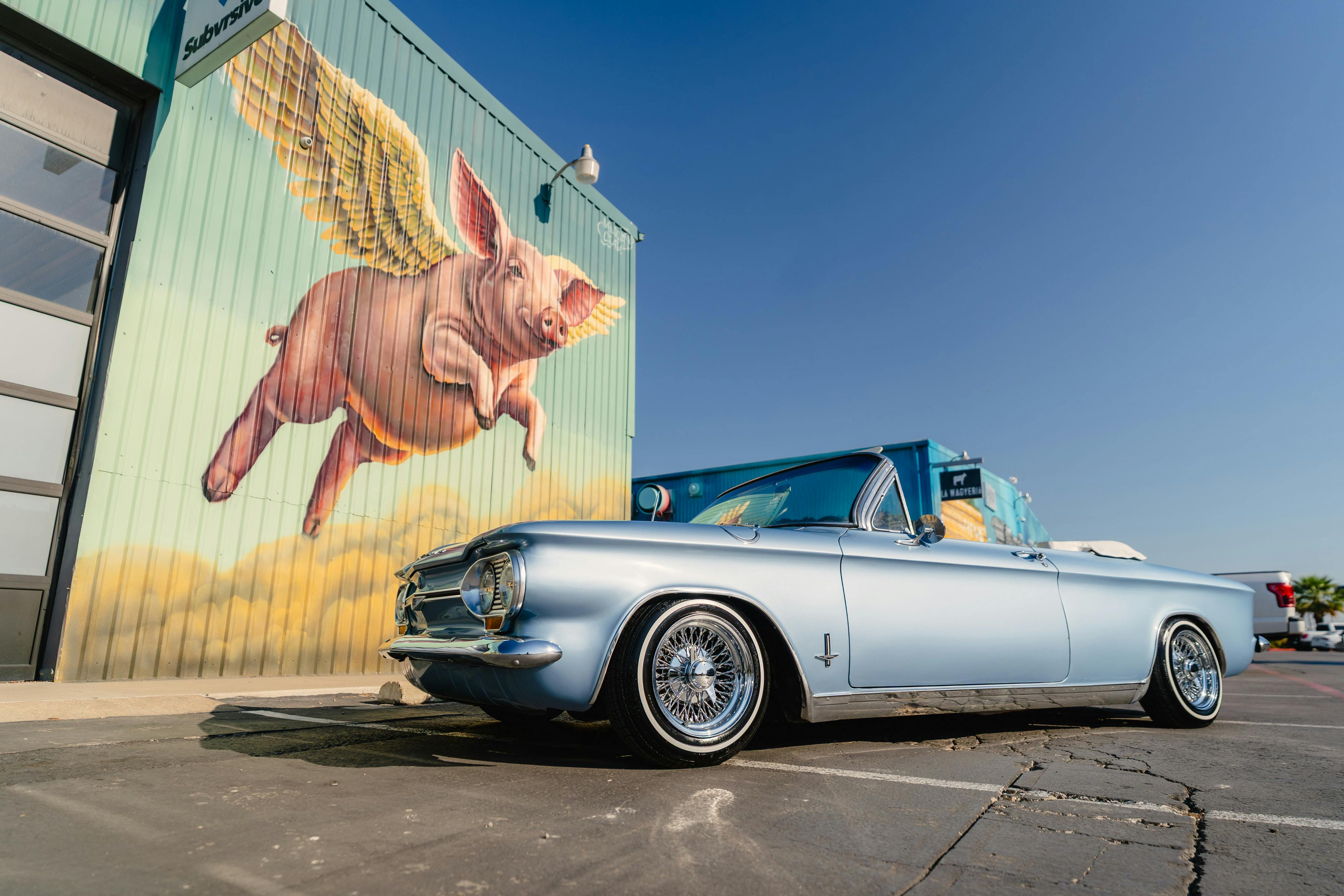 1966 Chevrolet Corvair Convertible in Blue with white interior shot in Austin, TX near St. Elmo.