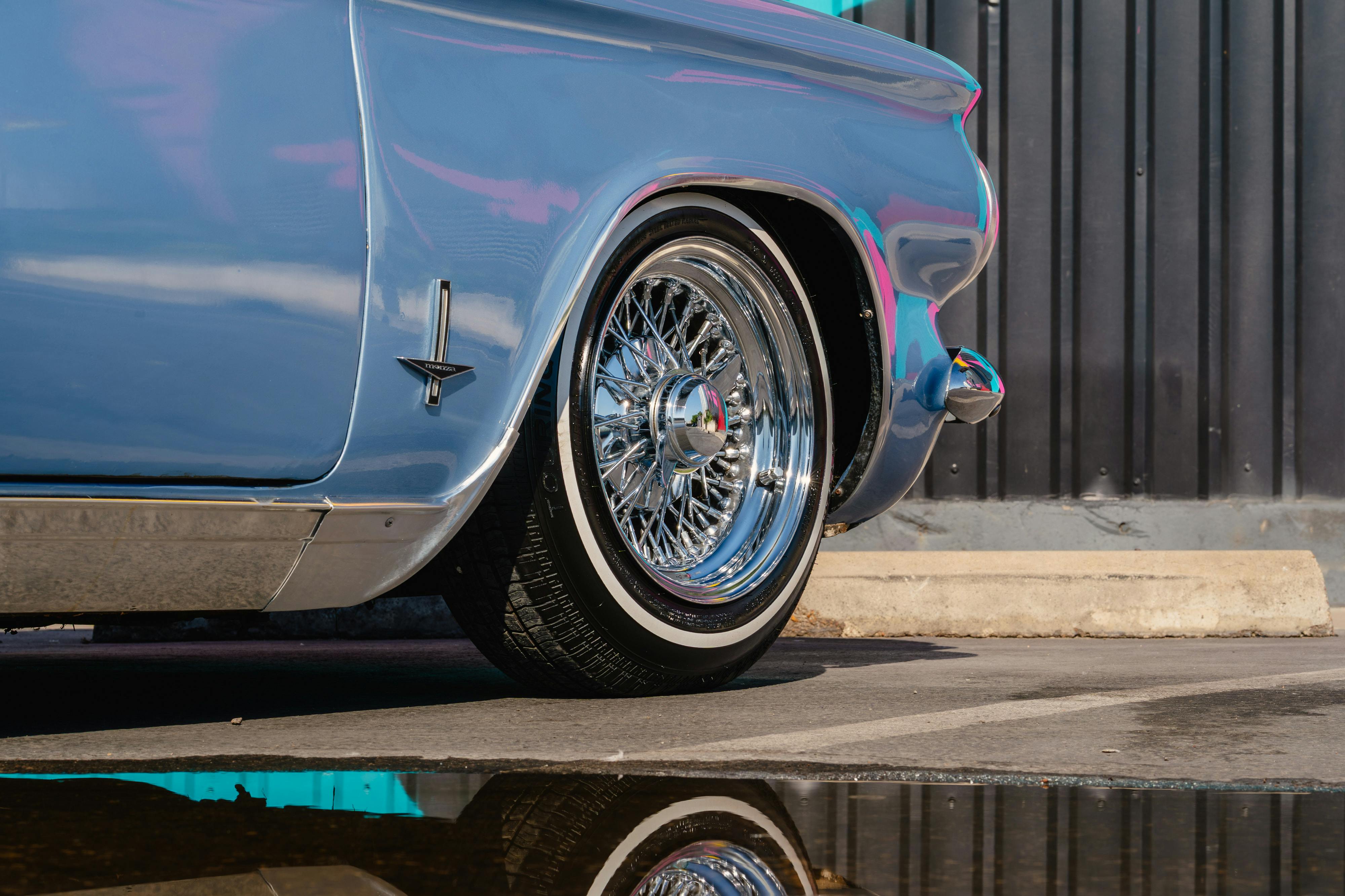 1966 Chevrolet Corvair Convertible in Blue with white interior shot in Austin, TX near St. Elmo.