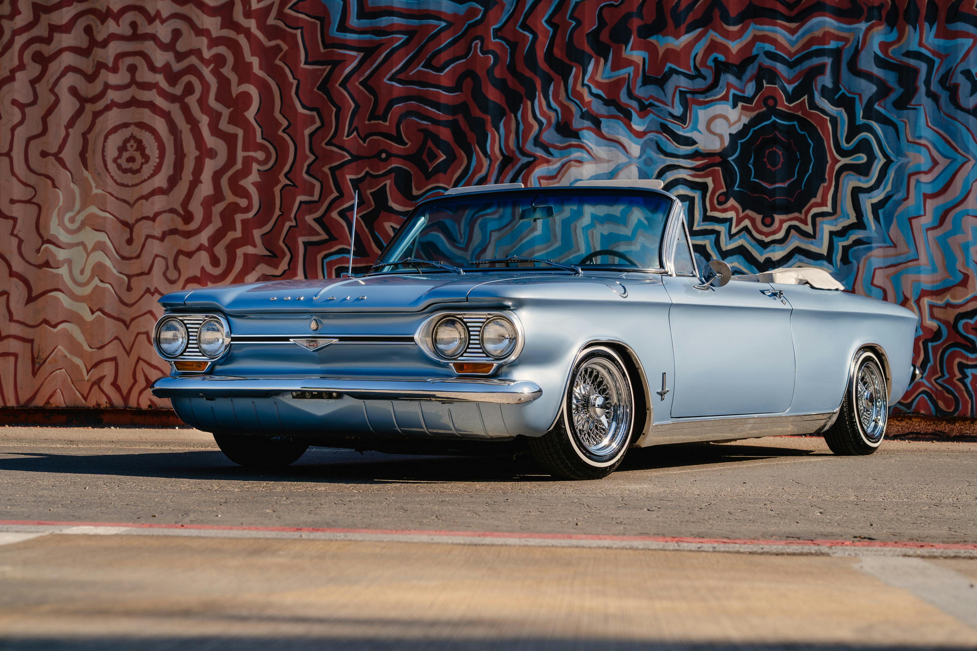 1966 Chevrolet Corvair Convertible in Blue with white interior shot in Austin, TX near St. Elmo.
