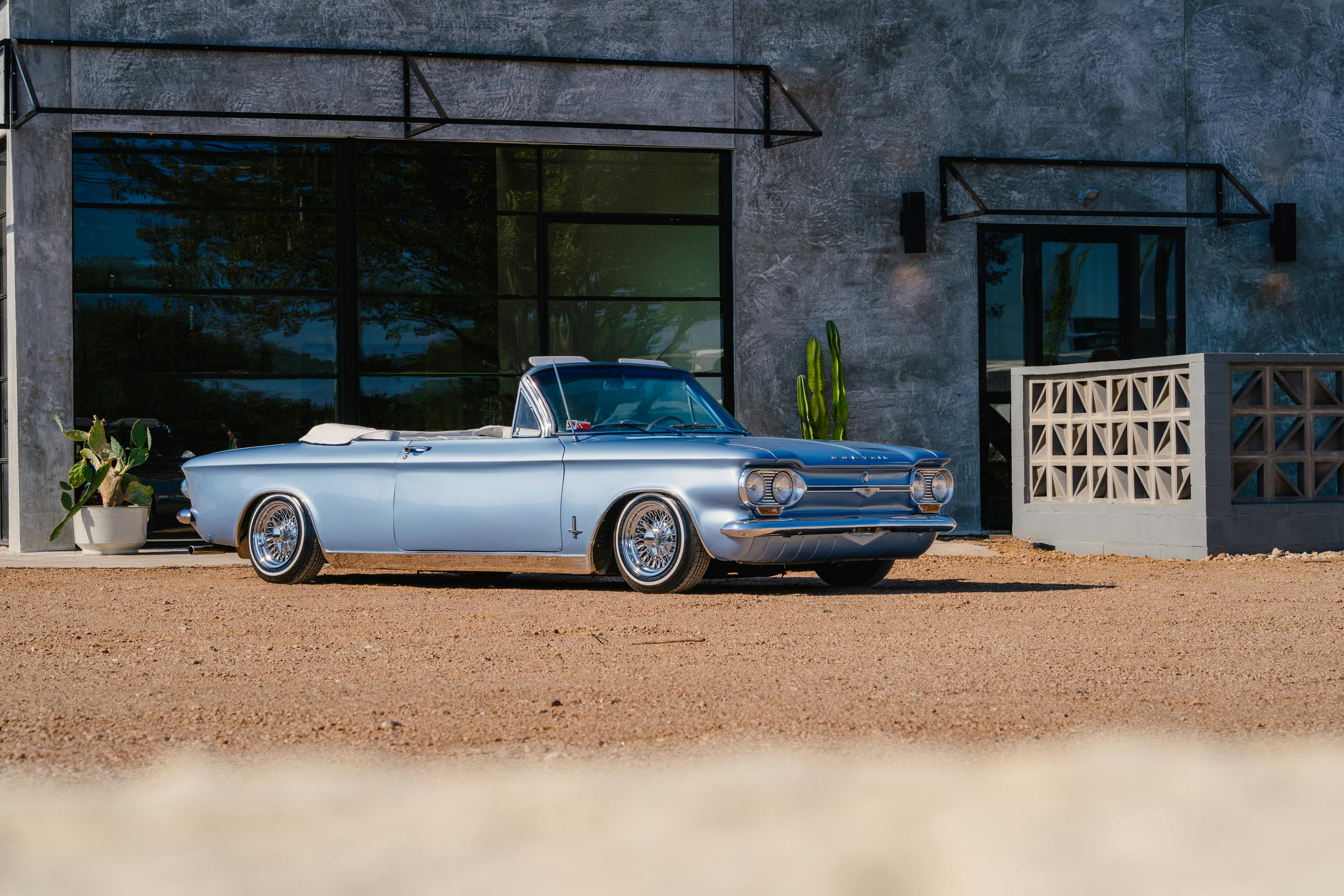 1966 Chevrolet Corvair Convertible in Blue with white interior shot in Austin, TX near St. Elmo.