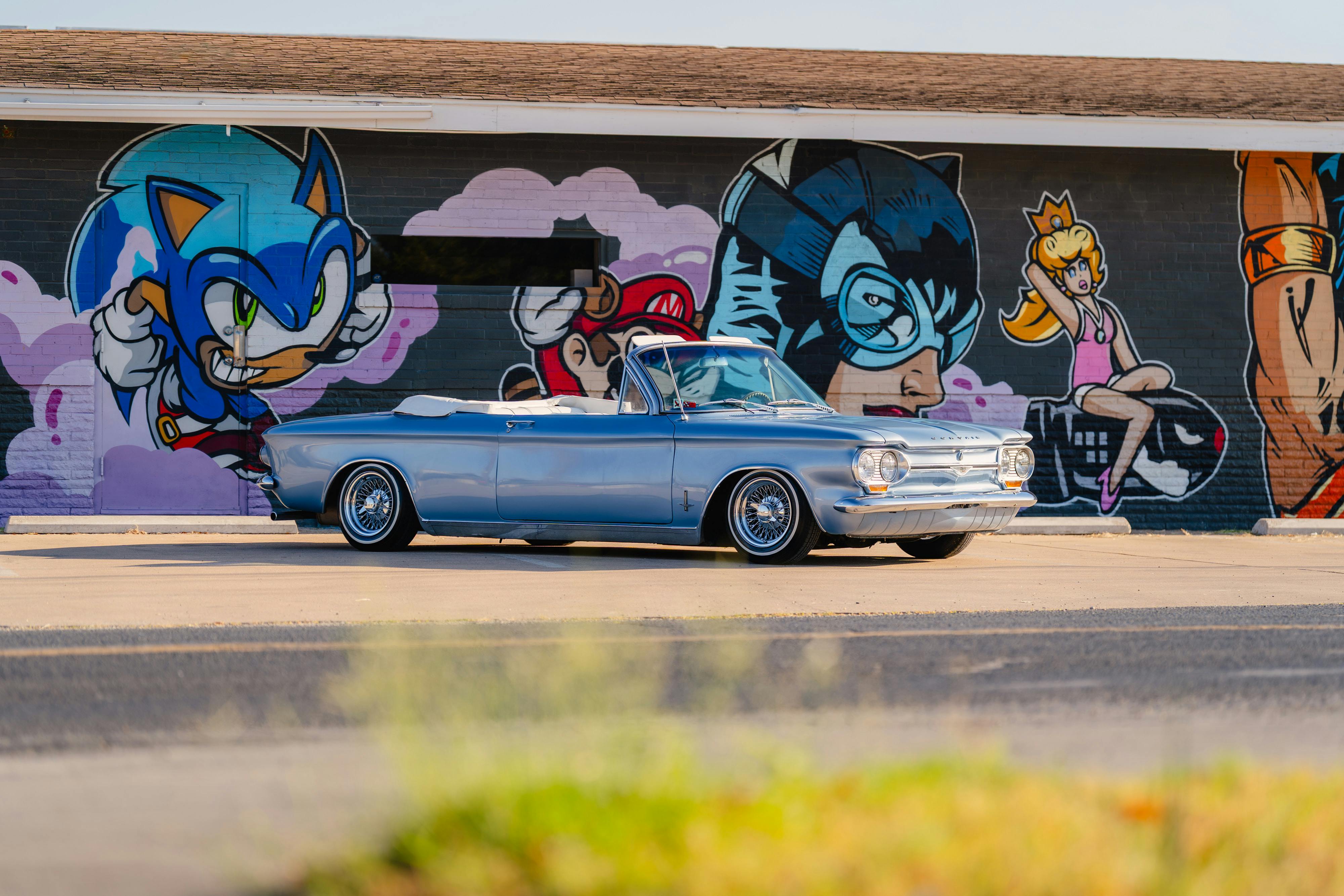 1966 Chevrolet Corvair Convertible in Blue with white interior shot in Austin, TX near St. Elmo.
