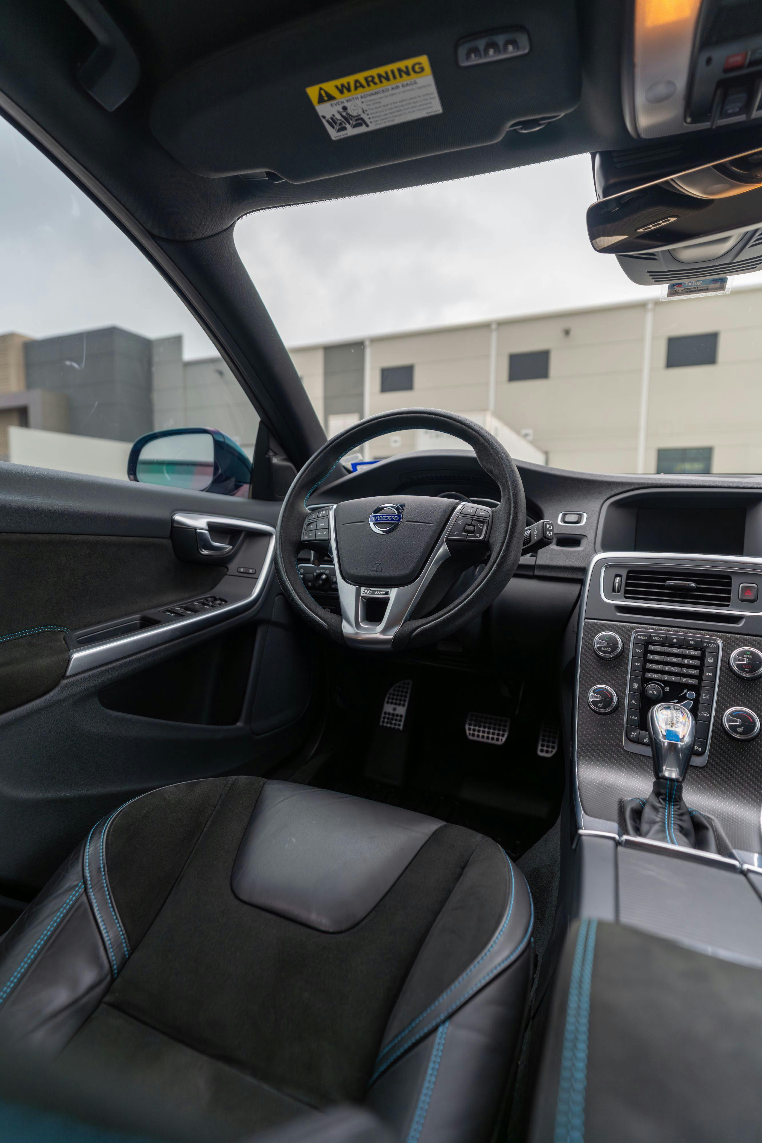 2015 Volvo V60 Polestar interior in Rebel Blue on Black.