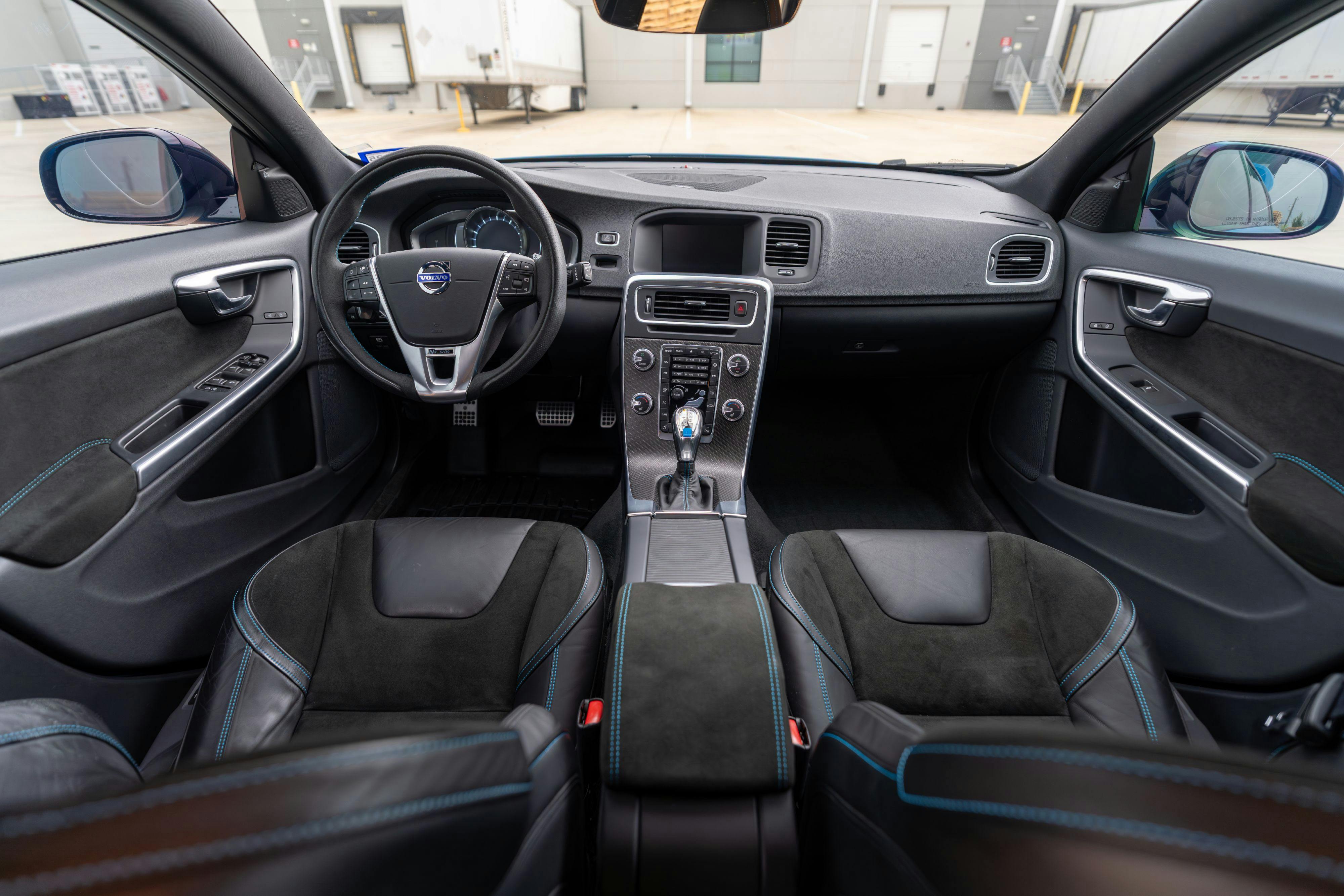 2015 Volvo V60 Polestar interior in Rebel Blue on Black.
