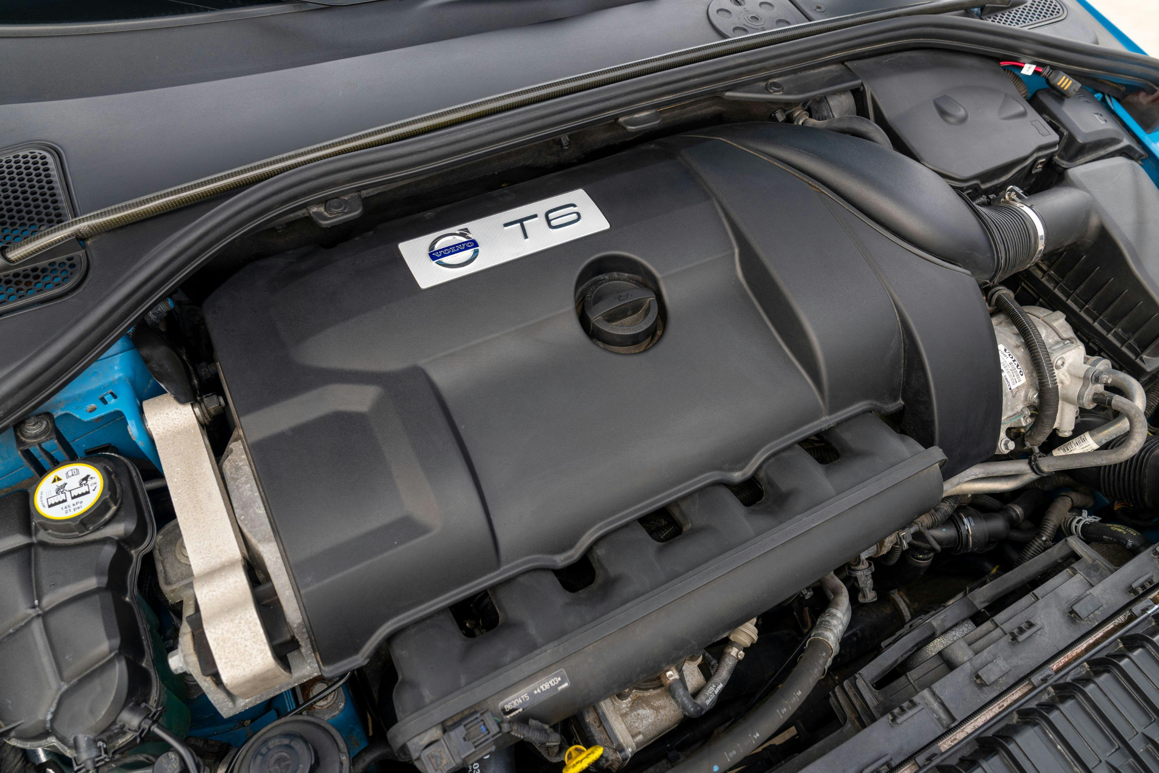 2015 Volvo V60 Polestar engine in Rebel Blue with a Black interior.