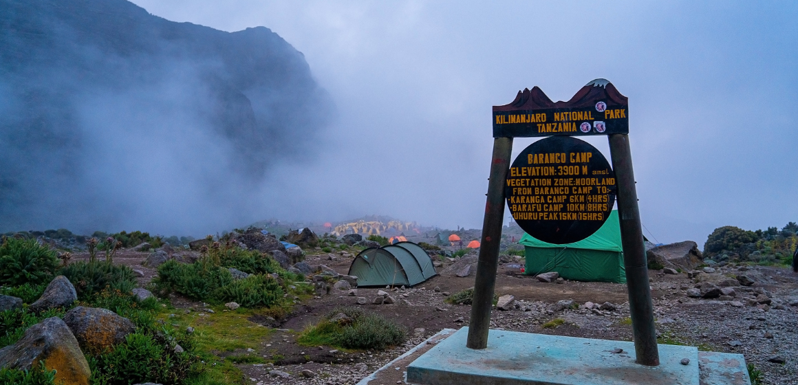 Sign-for-the-Baranco-Camp-on-the-Lemosho-route-on-Kilimanjaro---The-Adventure-People.png