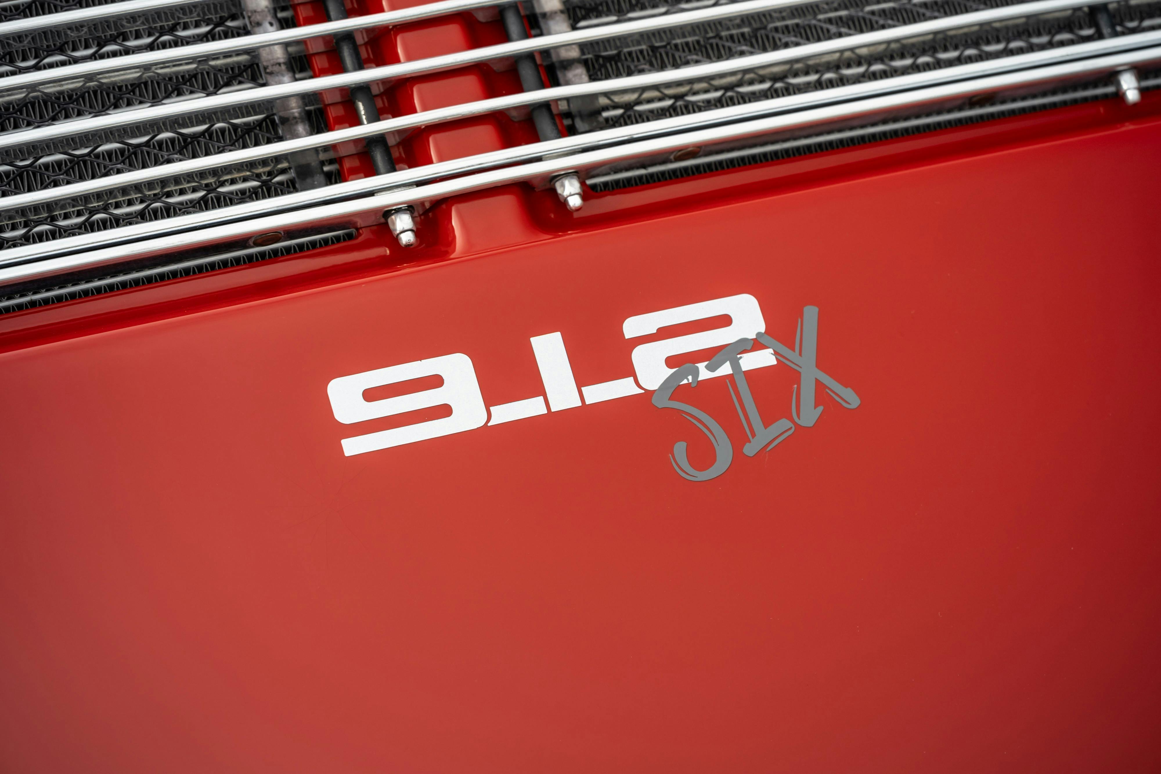 912-Six badge on a 3.0L swapped 1967 Porsche 912 Coupe in Dripping Springs, TX.