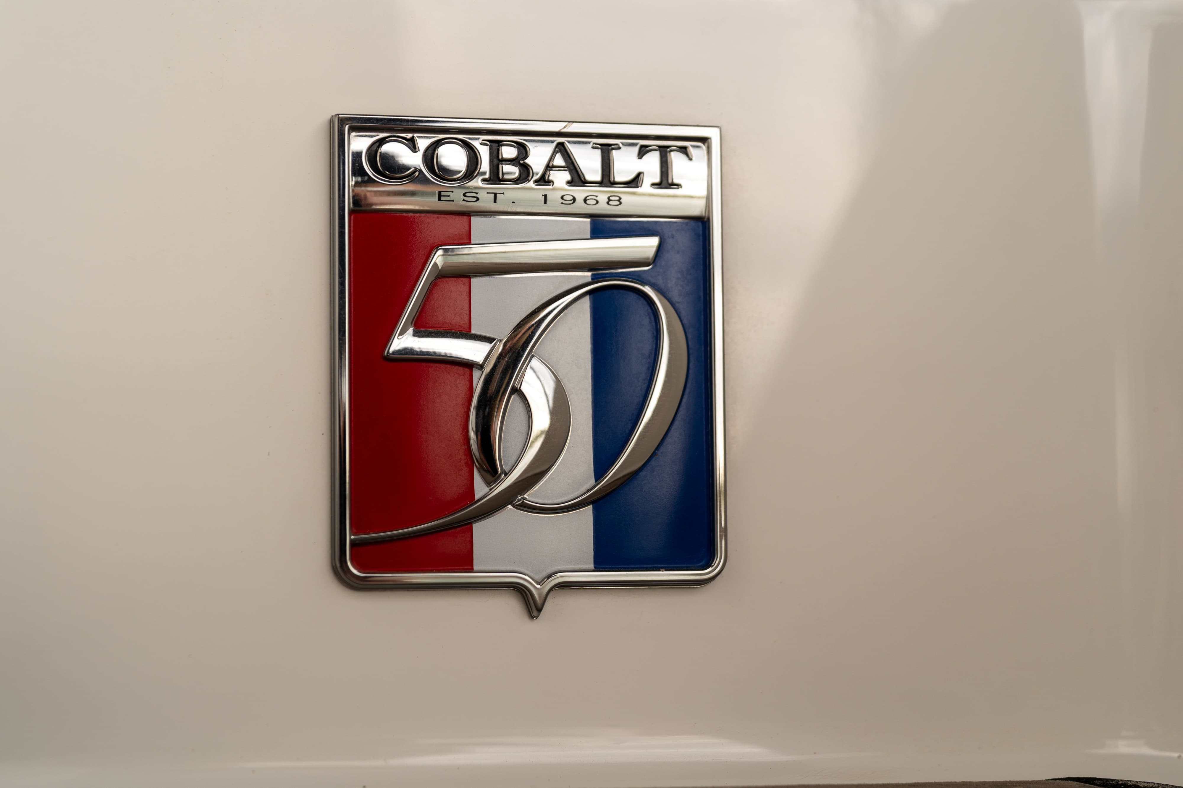 Badging on a 2018 Cobalt R7 Surf boat in Lakeway, TX.