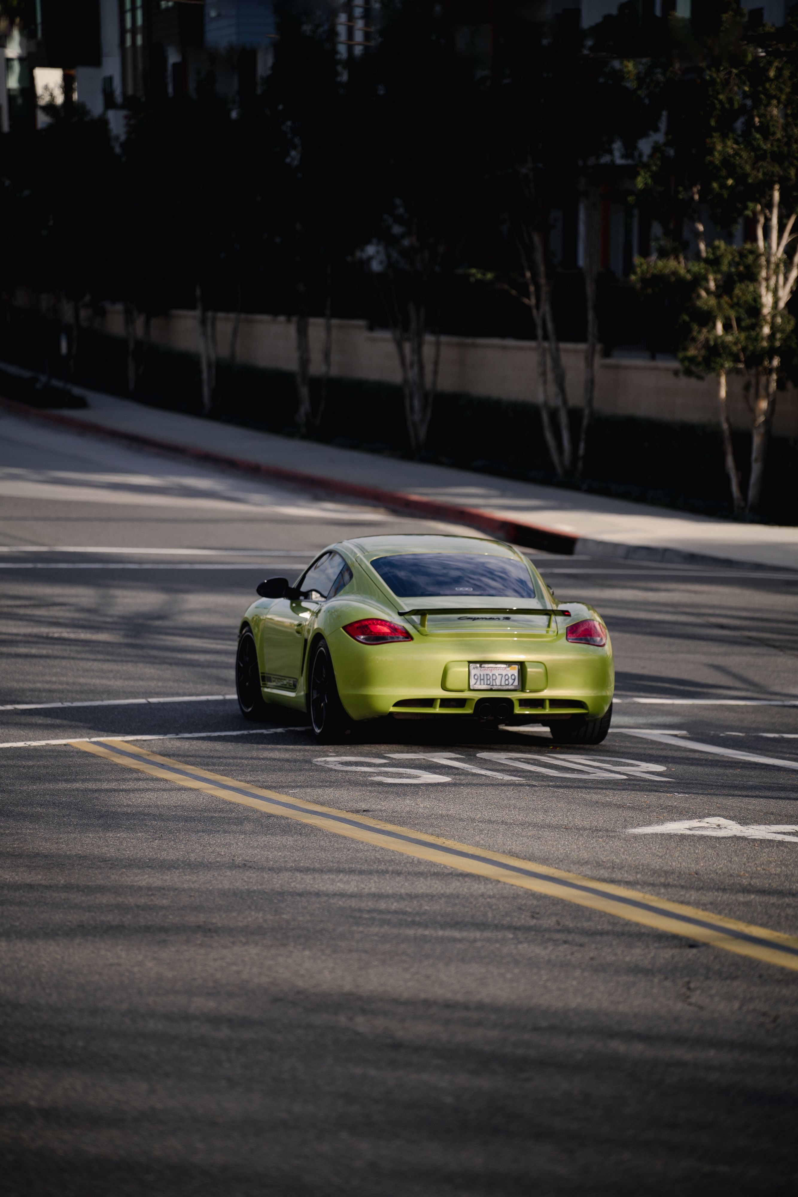 Porsche Cayman R in Peridot Green outside of Car Parc.