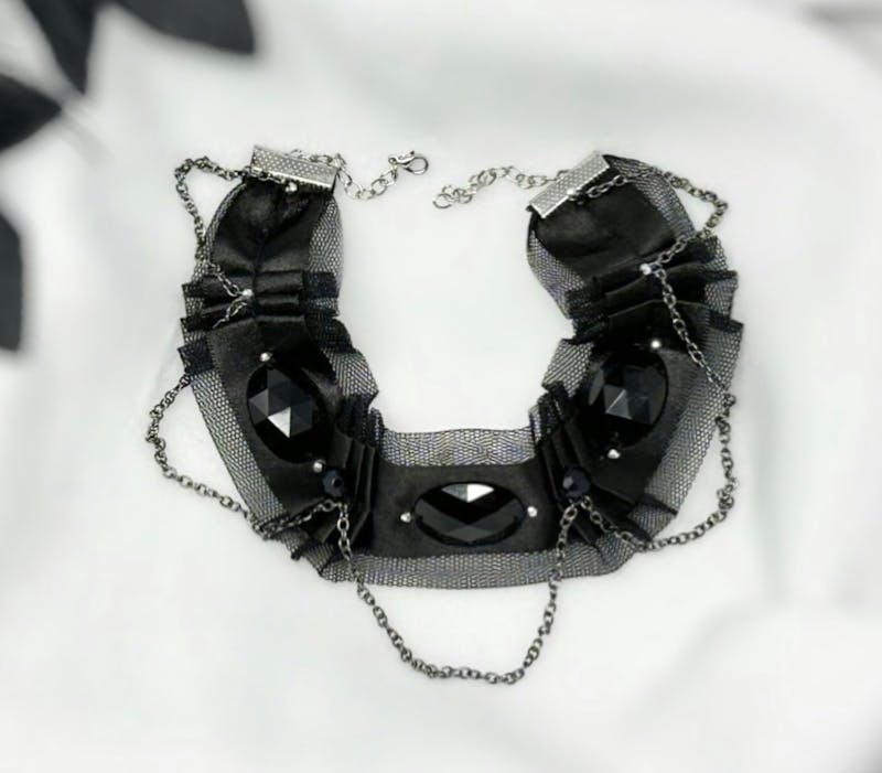 Wide black choker collar with rhinestones and chains