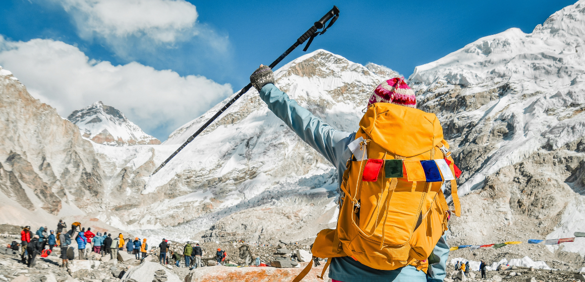 Female-trekker-with-a-backpack-at-Everest-Base-Camp---The-Adventure-People.png