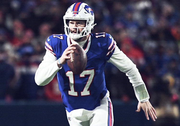 Bills QB Josh Allen scrambles during an NFL game.