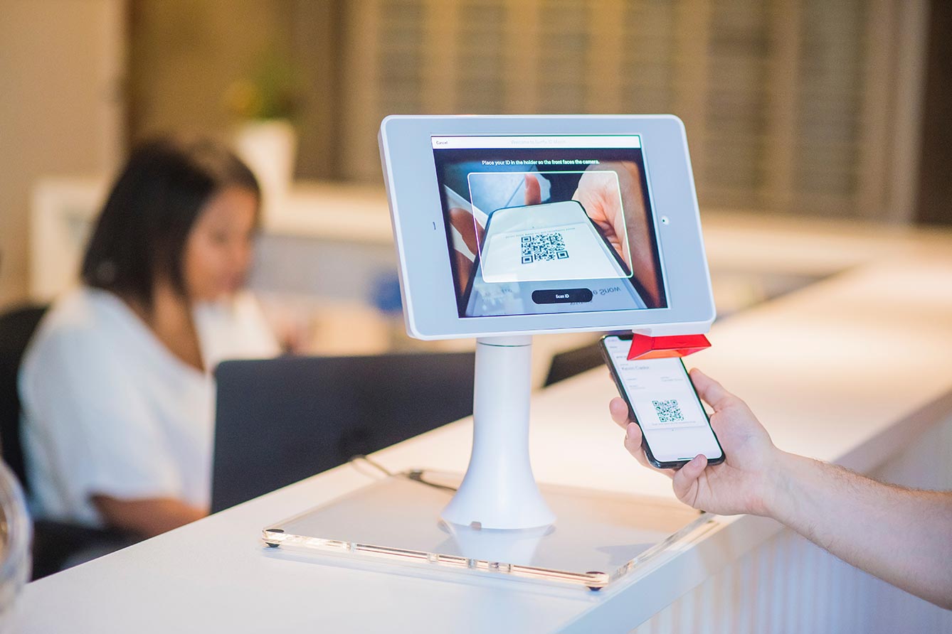 Tablet kiosk with a QR code scanner