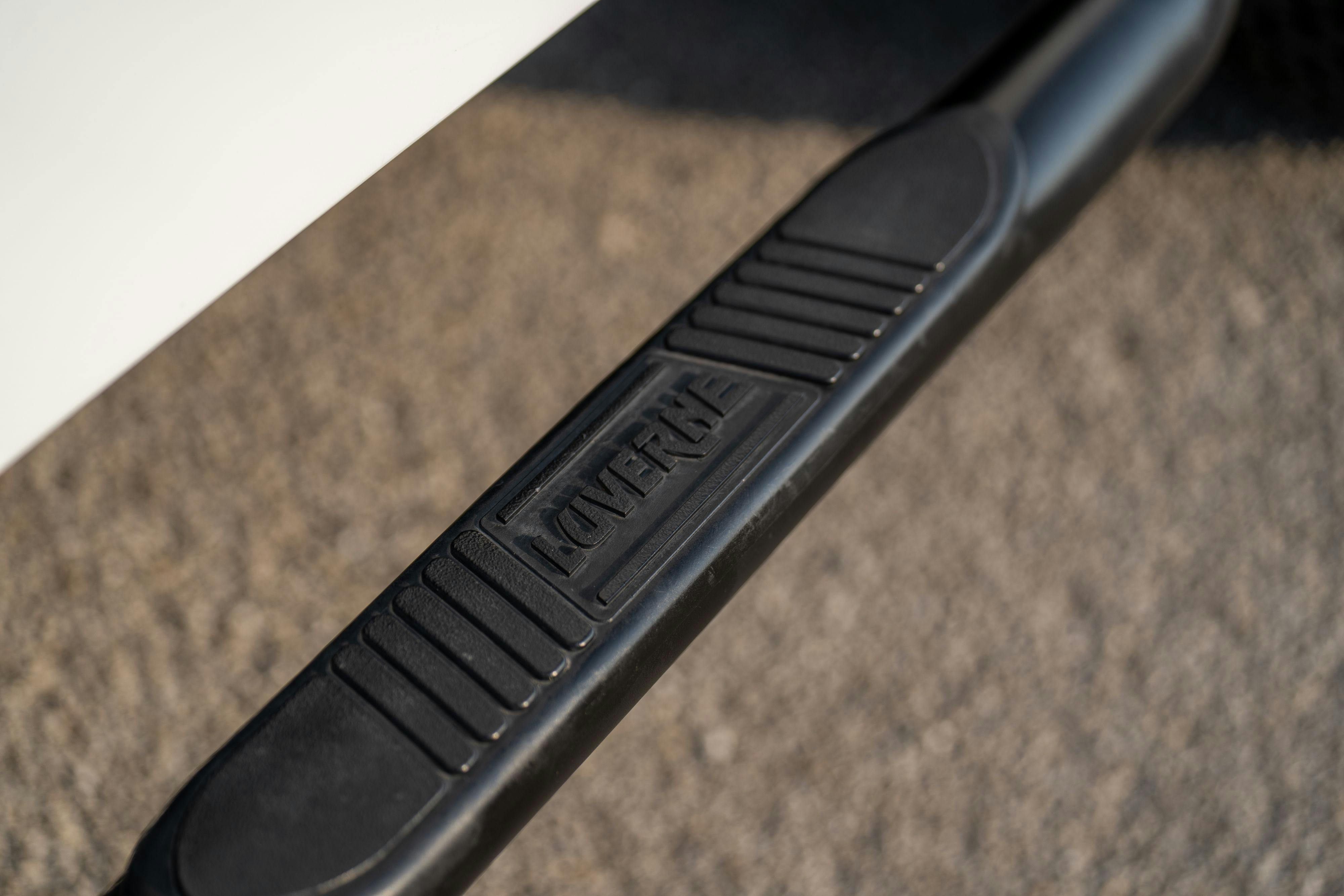 Stepsides on a 1983 Jeep Scrambler in White on Black in Austin, TX.