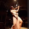 It's a regular sized violin, but the best dinner & show in the world.