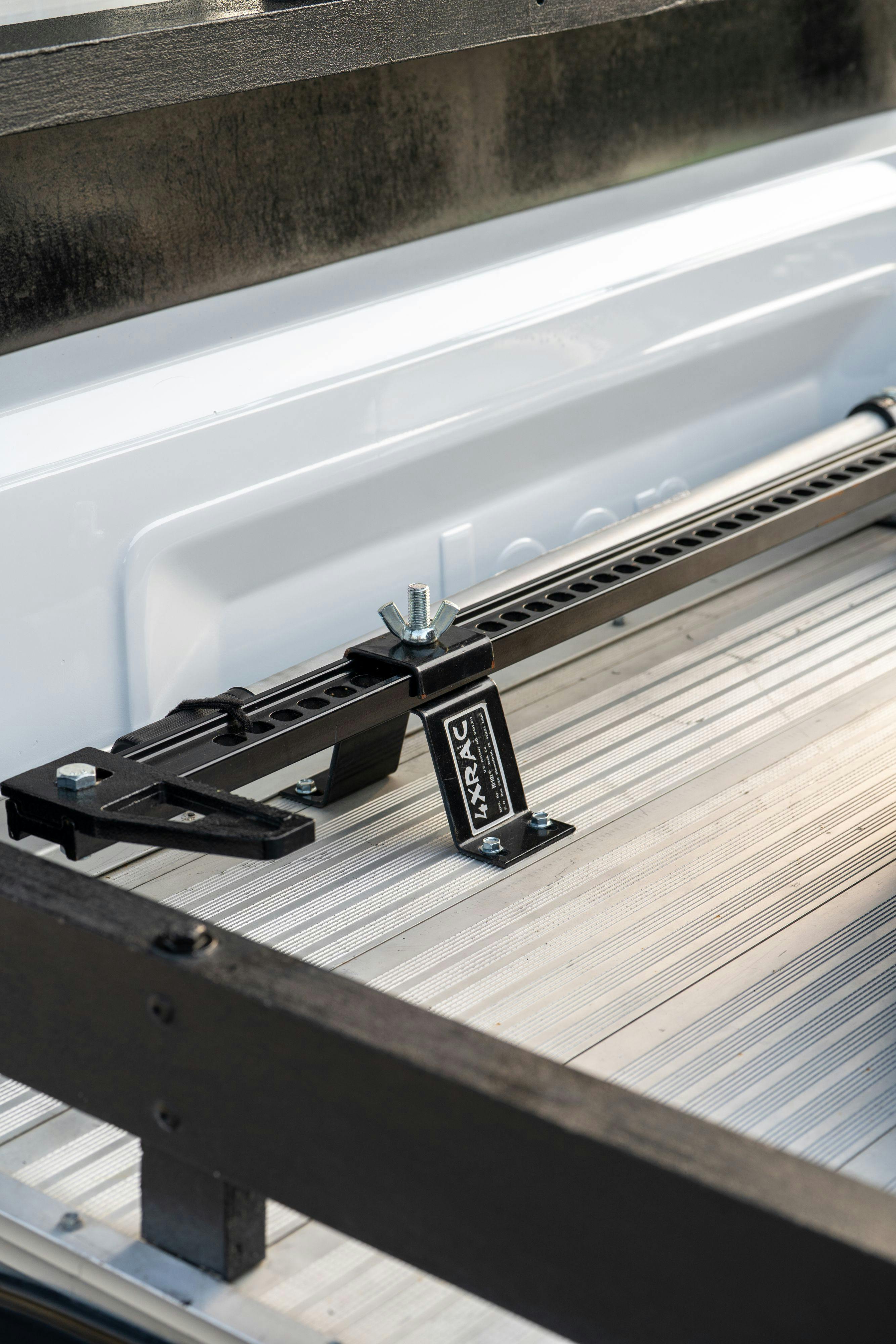 Offroad jack on a 1983 Jeep Scrambler in White on Black in Austin, TX.