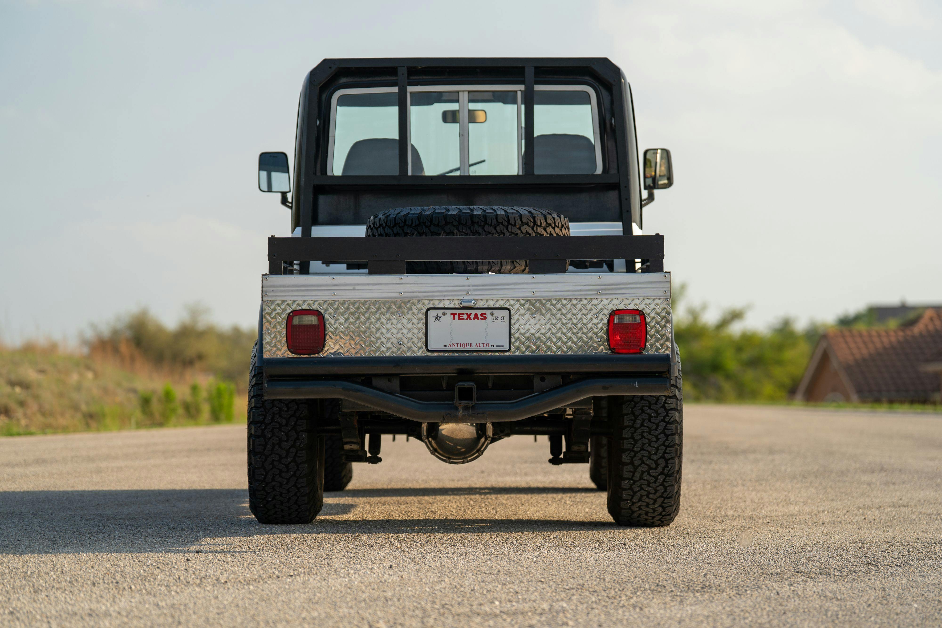 1983 Jeep Scrambler in White on Black in Austin, TX.