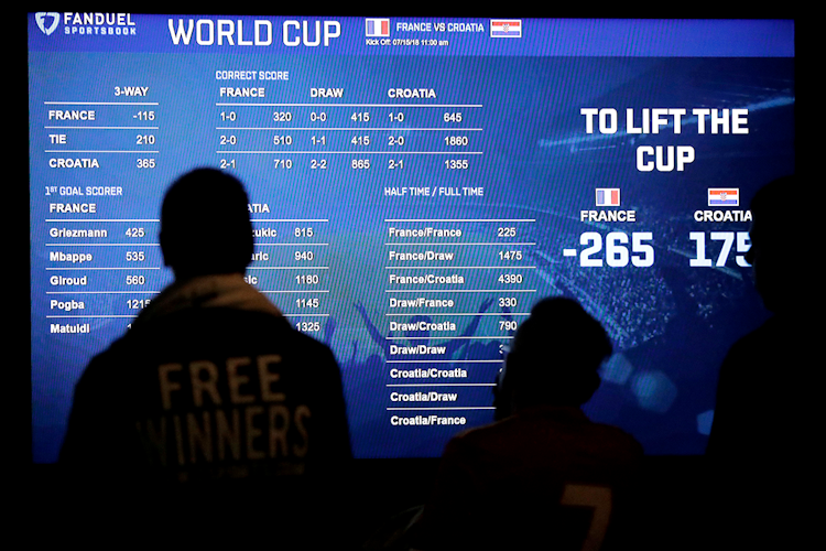 Sports betting board showing live World Cup odds and betting lines for France vs Croatia during the 2018 FIFA World Cup Final.