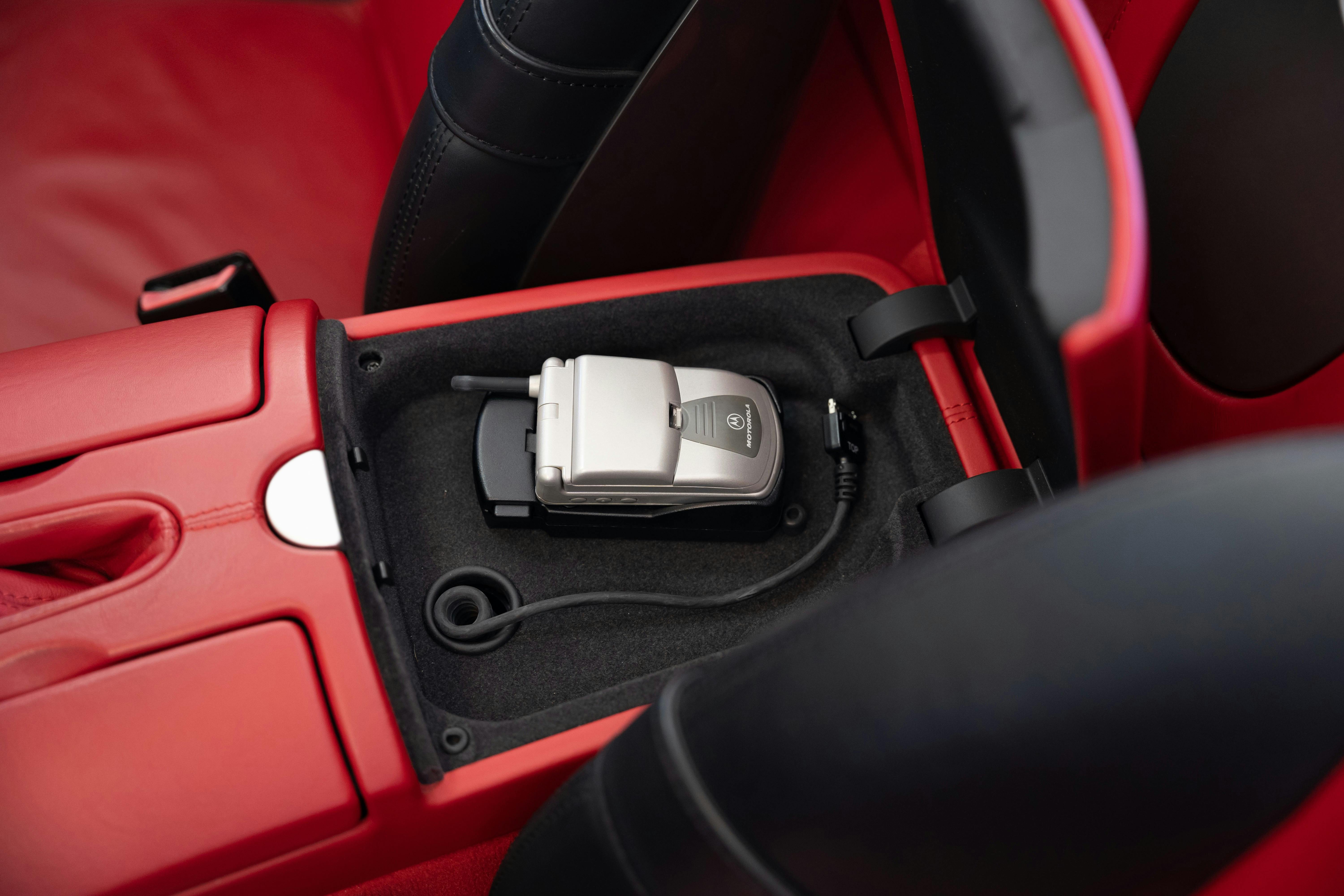 Built-in cell phone of a 2002 BMW Z8 in Blanco, TX.