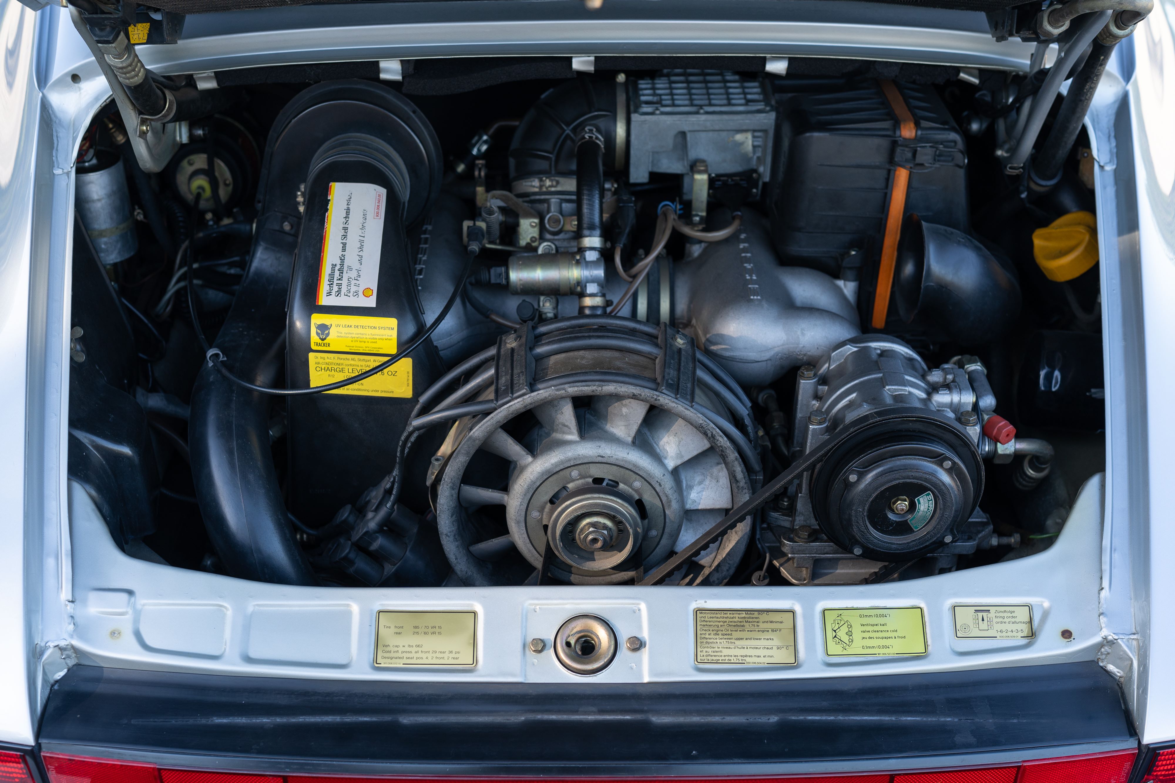 Engine bay of a Silver Grey leather in a 1987 Porsche 911 Carrera G50 Coupe in Silver Metallic in Dripping Springs, TX.