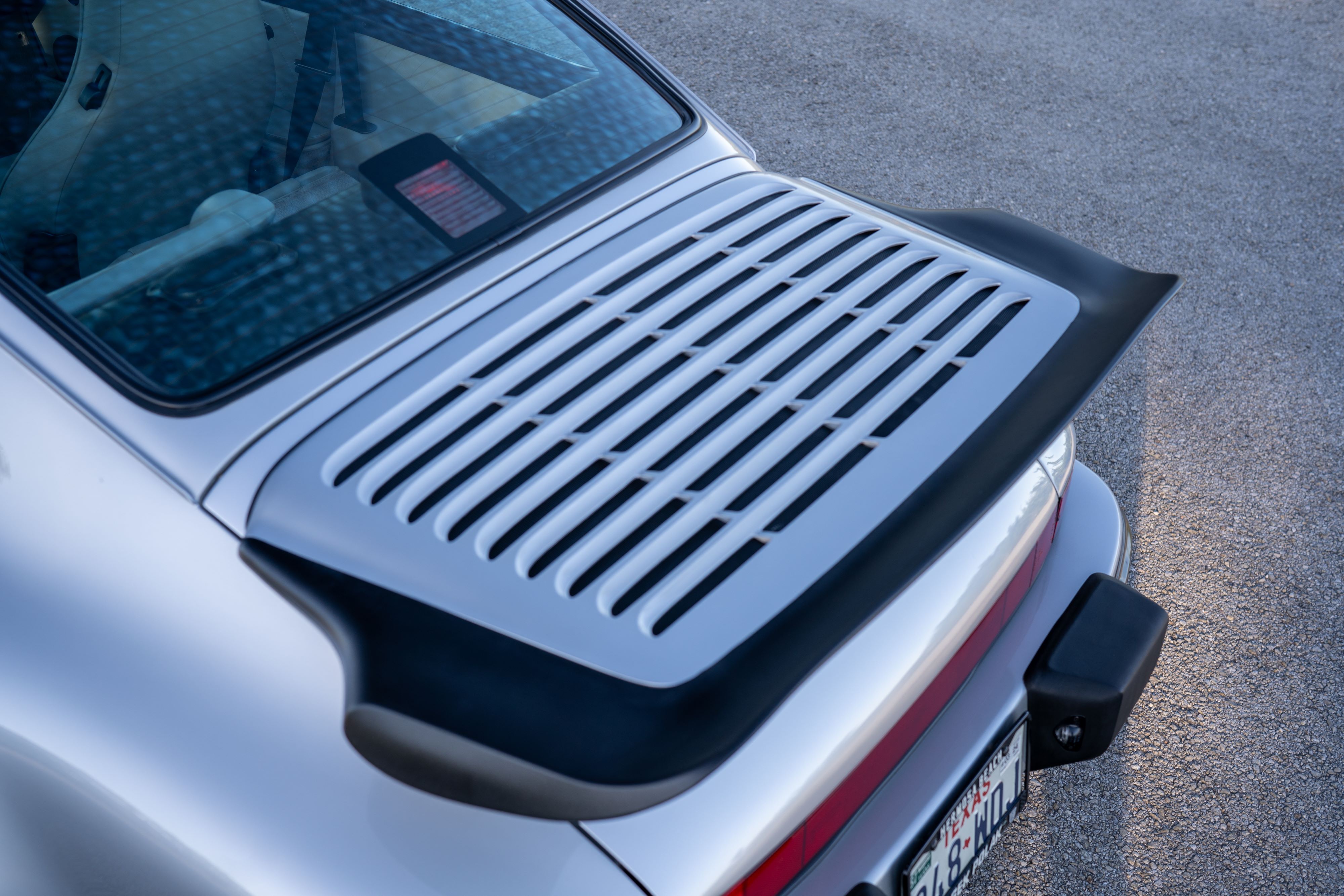 Whale tail on a 1987 Porsche 911 Carrera G50 Coupe in Silver Metallic in Dripping Springs, TX.